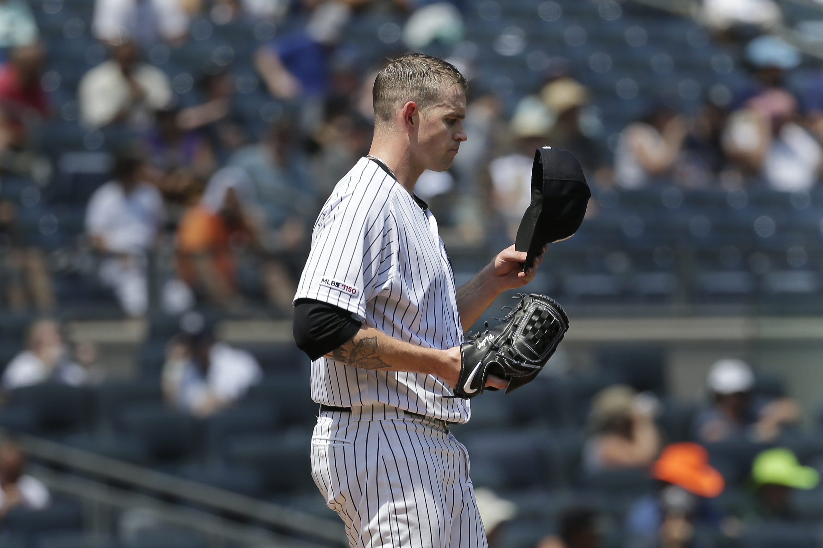 Paxton stumbles again, Rockies beat Yanks 8-4 to stop slide