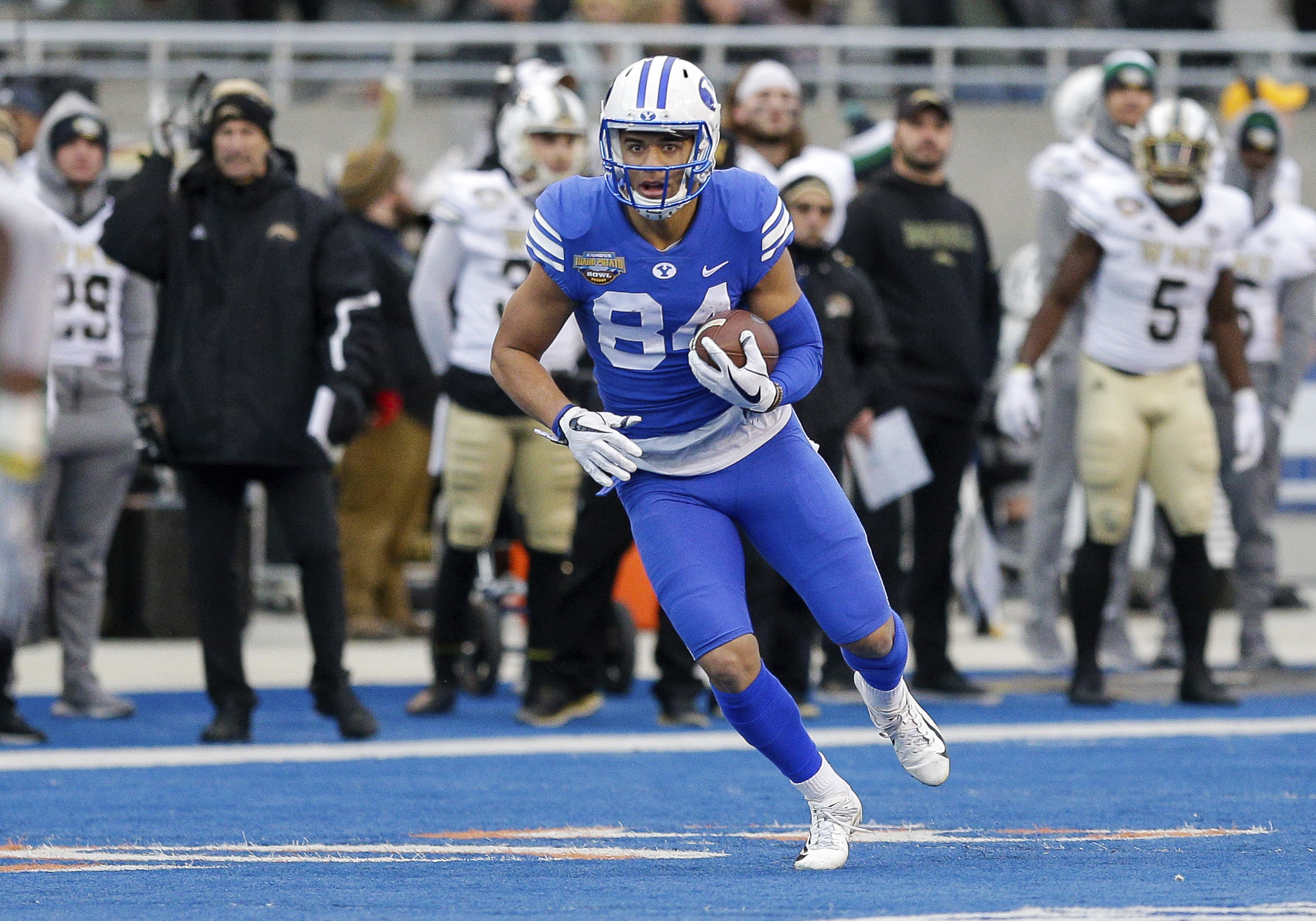 In this Dec. 21, 2018, file photo, BYU wide receiver Neil Pau'u (84) runs with the ball after a reception against Western Michigan in the second half of the Famous Idaho Potato Bowl an NCAA college football game, in Boise, Idaho. (Photo: Steve Conner, AP)