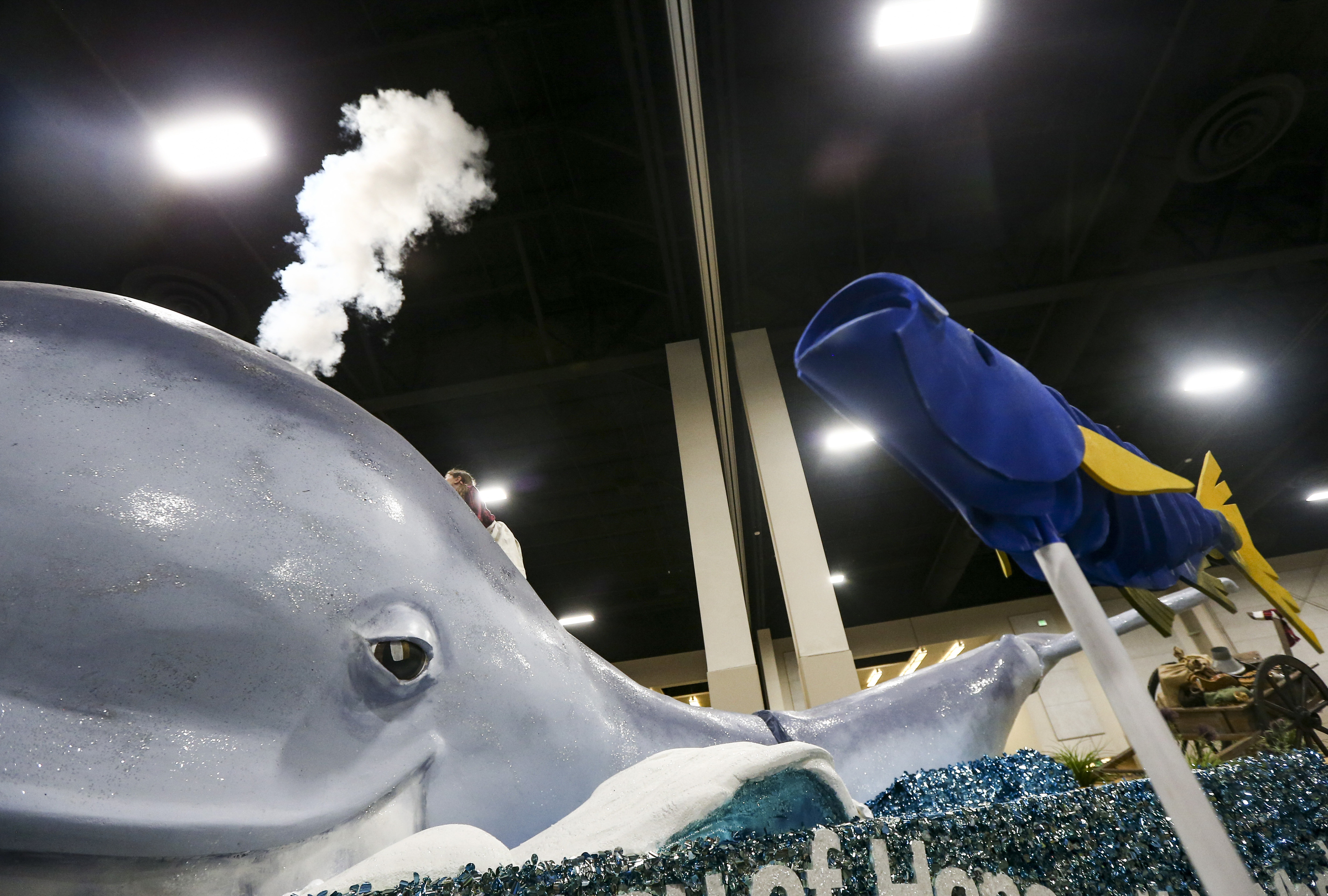A fish swims by as the South Jordan Founders Park Stake whale float blows during the Days of 47 Float Preview at the Mountain America Expo Center in Sandy on Monday, July 22, 2019. Float makers put their floats on display Monday and Tuesday for the community to get up close before the parade. (Photo: Colter Peterson,KSL.)