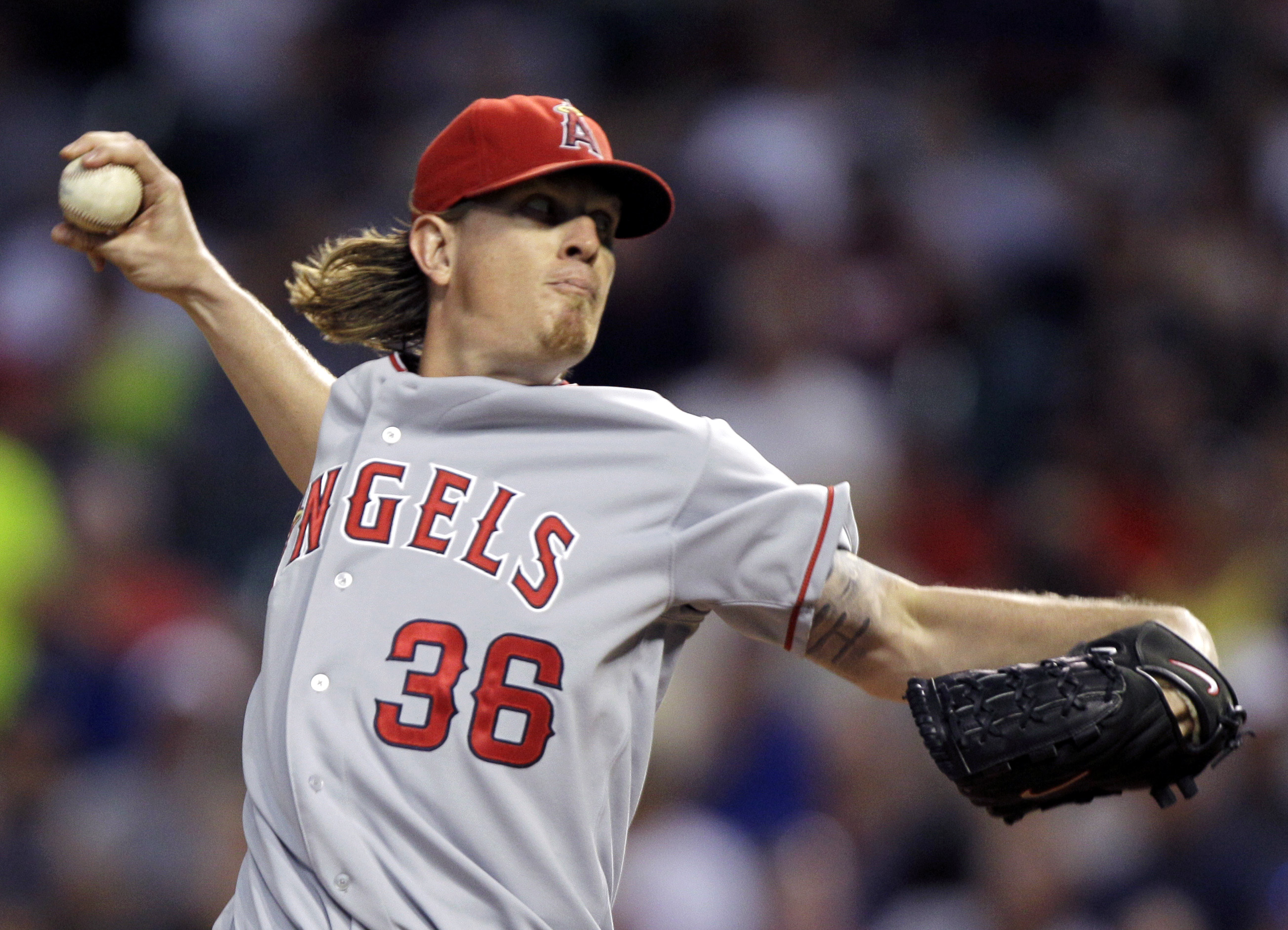 Los Angeles Angels' Jered Weaver pitches against the Cleveland Indians during the seventh inning of a baseball game, Tuesday, July 26, 2011, in Cleveland. Weaver gave up one run in seven innings and got the win in the Angels 2-1 victory. (Mark Duncan, AP Photo, File)