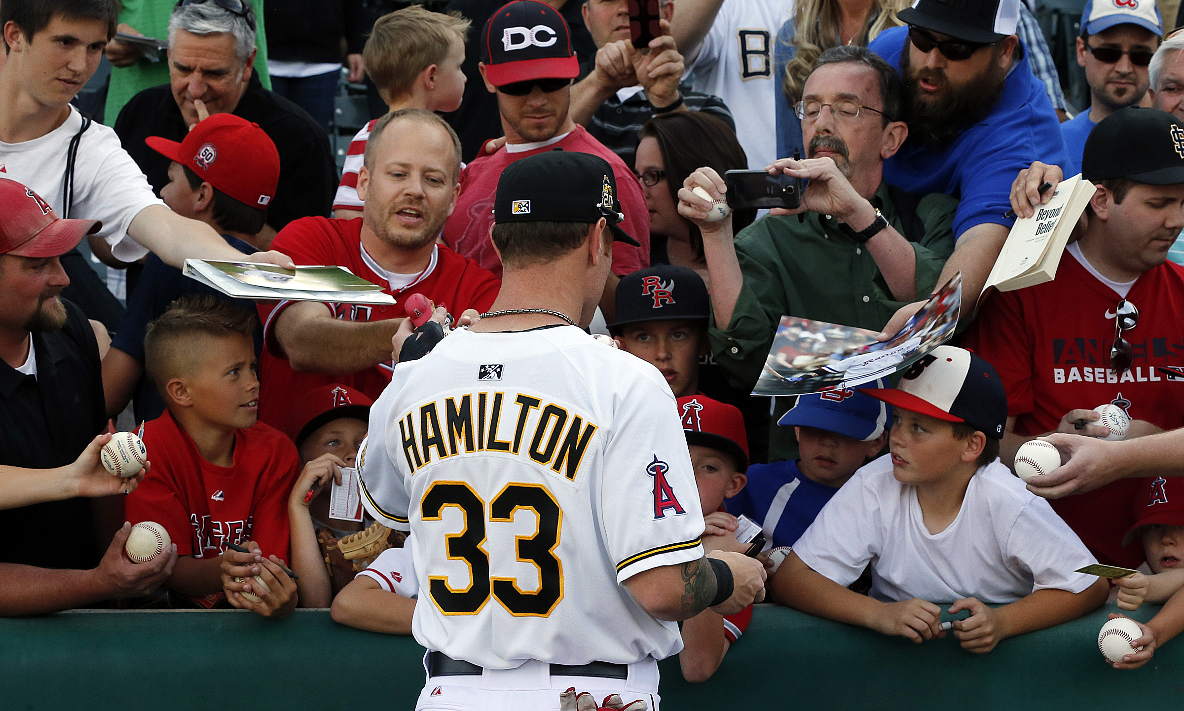 Josh Hamilton signs autographs before the Salt Lake Bees face the Albuquerque Isotopes in PCL baseball at Smith's Ballpark in Salt Lake City, Thursday, May 22, 2014. (Photo: Ravell Call, KSL, File)