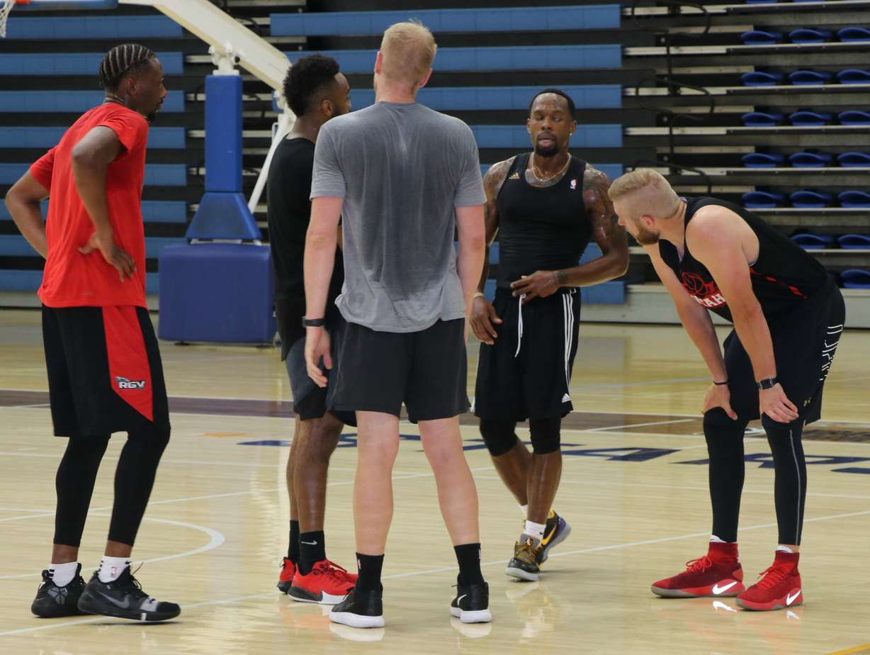Former Runnin' Utes guard Dakarai Tucker, left, works out with Team Utah at Salt Lake Community College before the Utah alumni squad opens The Basketball Tournament, Thursday, at Maverik Center in West Valley. (Photo: Sean Walker, KSL.com)