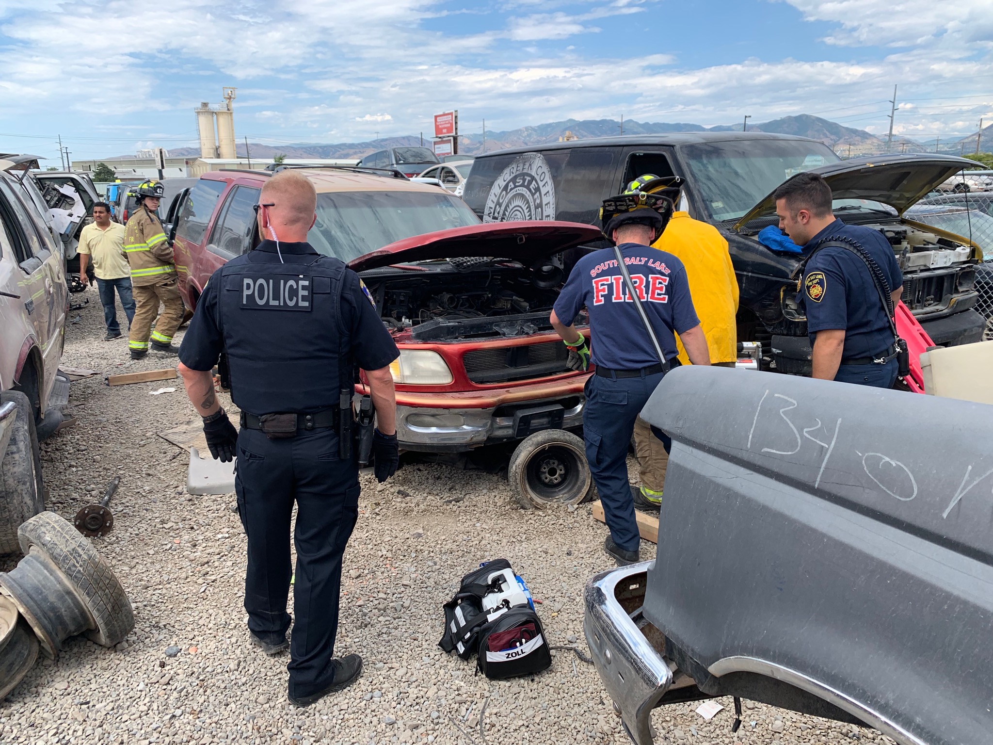 Man dies in South Salt Lake after car falls off lifts, pins him