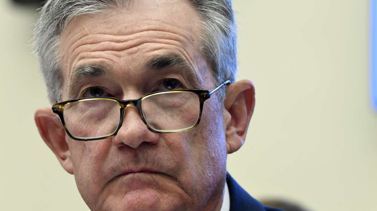 Fed cuts key rate in its first reduction in more than decade