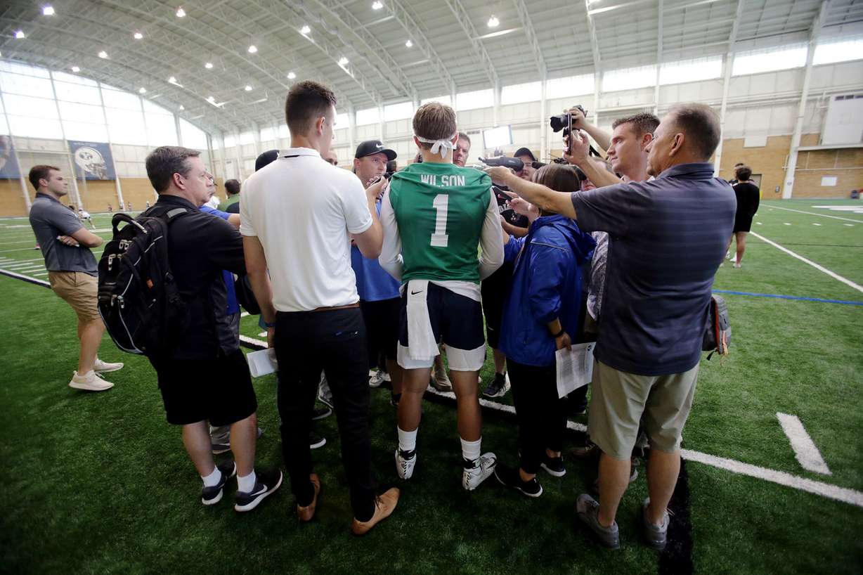 Quarterback Zach Wilson, talks with members of the media after BYU opened football practice at the indoor facility in Provo on Wednesday, July 31, 2019. (Photo: Scott G Winterton, Deseret News)