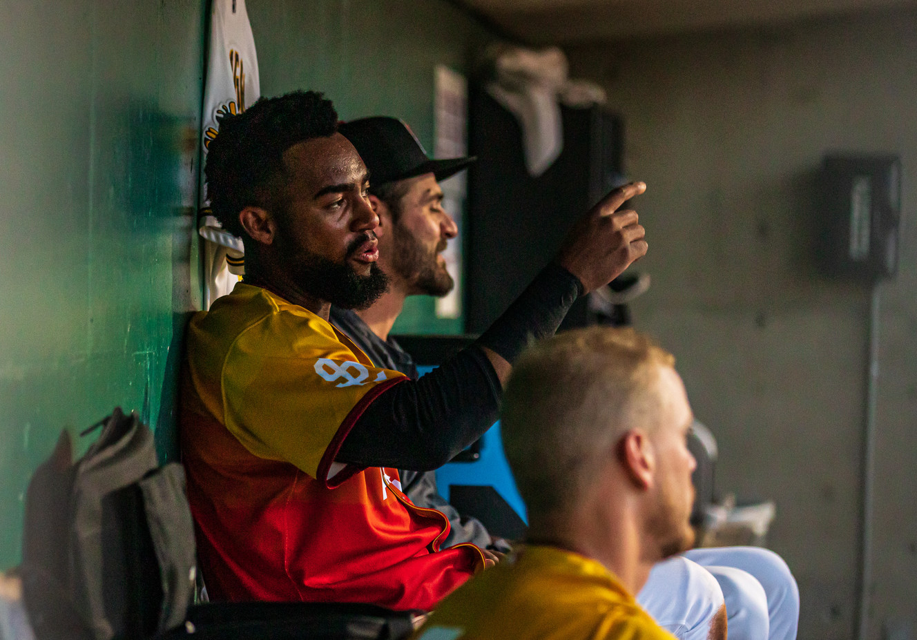 Salt Lake Bees outfielder Jo Adell chats with teammates in the dugout during a game at Smith's Ballpark on Thursday, Aug. 1, 2019. Adell was promoted to the Bees on Thursday.