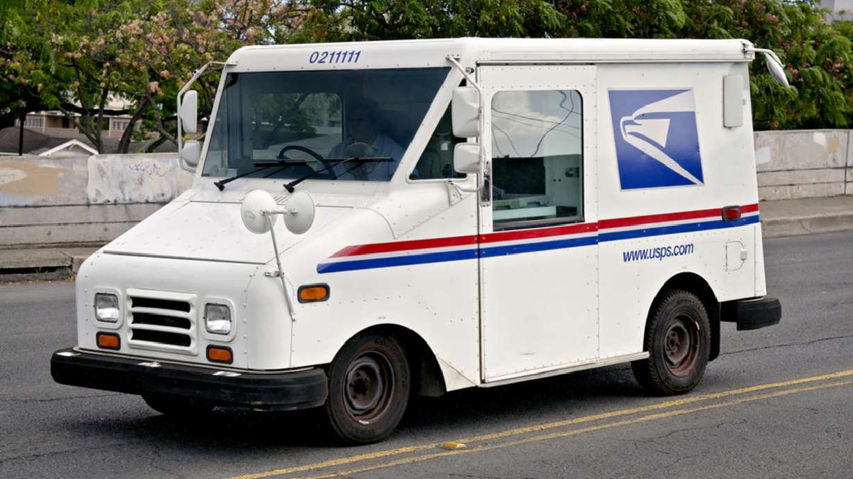 USPS worker cooks steak inside mail truck