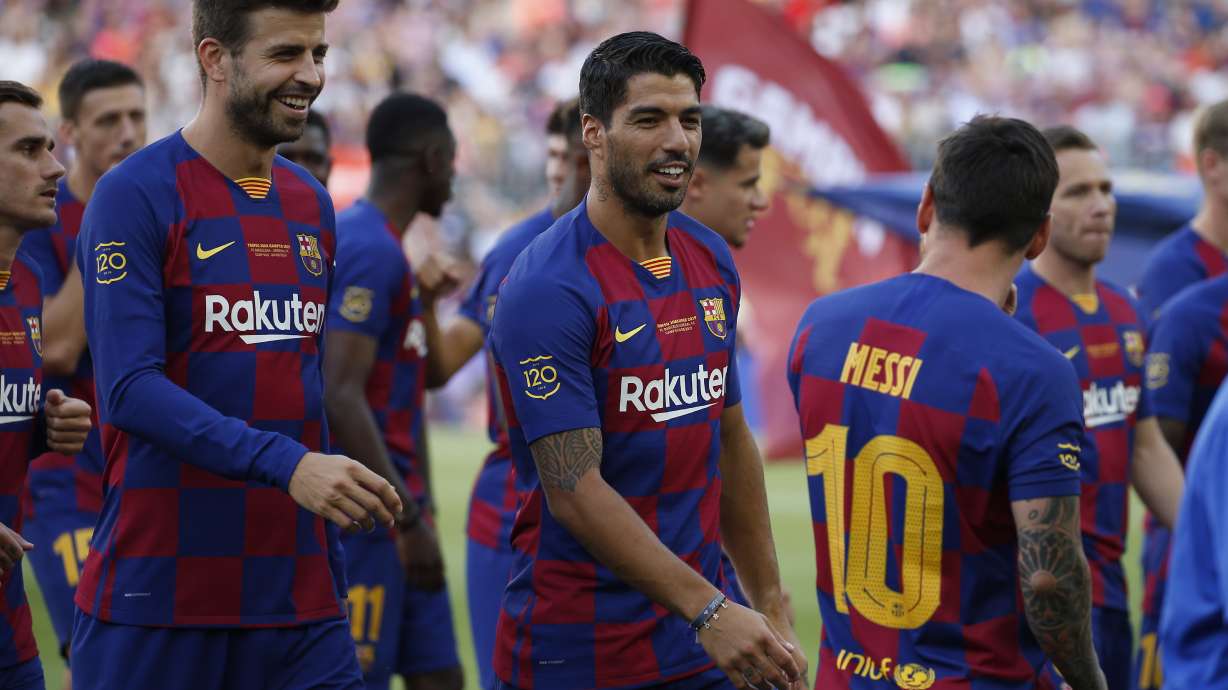 Messi strains calf, will miss Barcelona's US trip