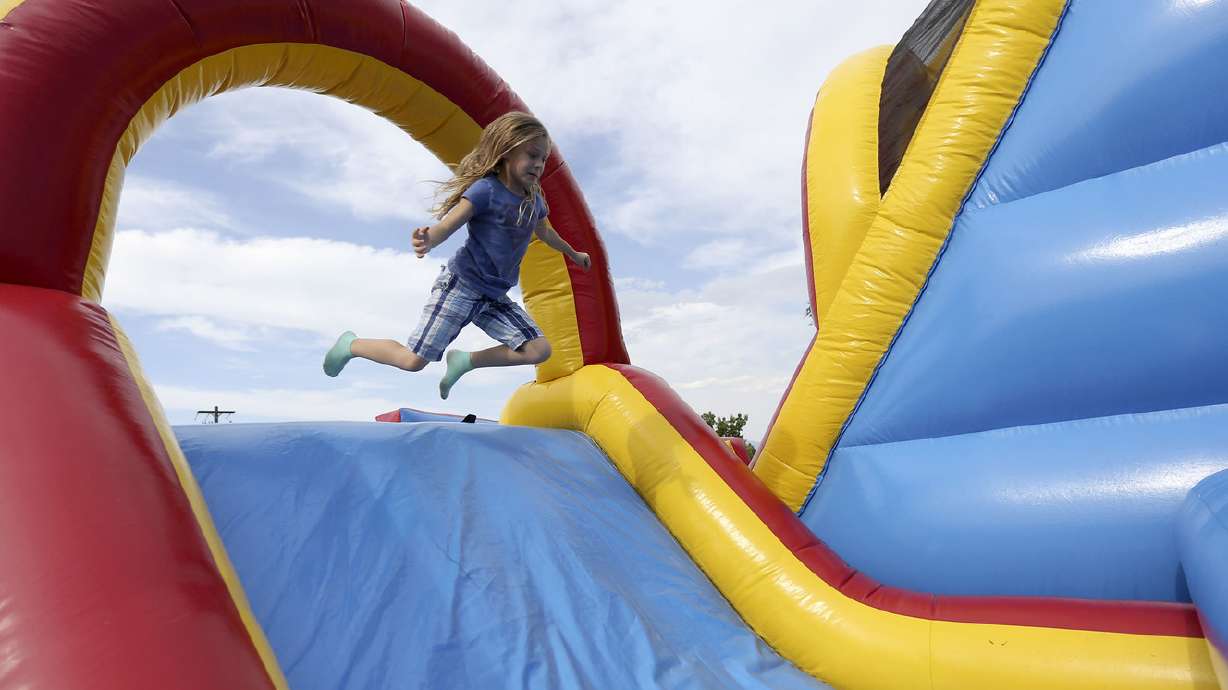 Unified police, firefighters enjoy a Night Out Against Crime in Magna