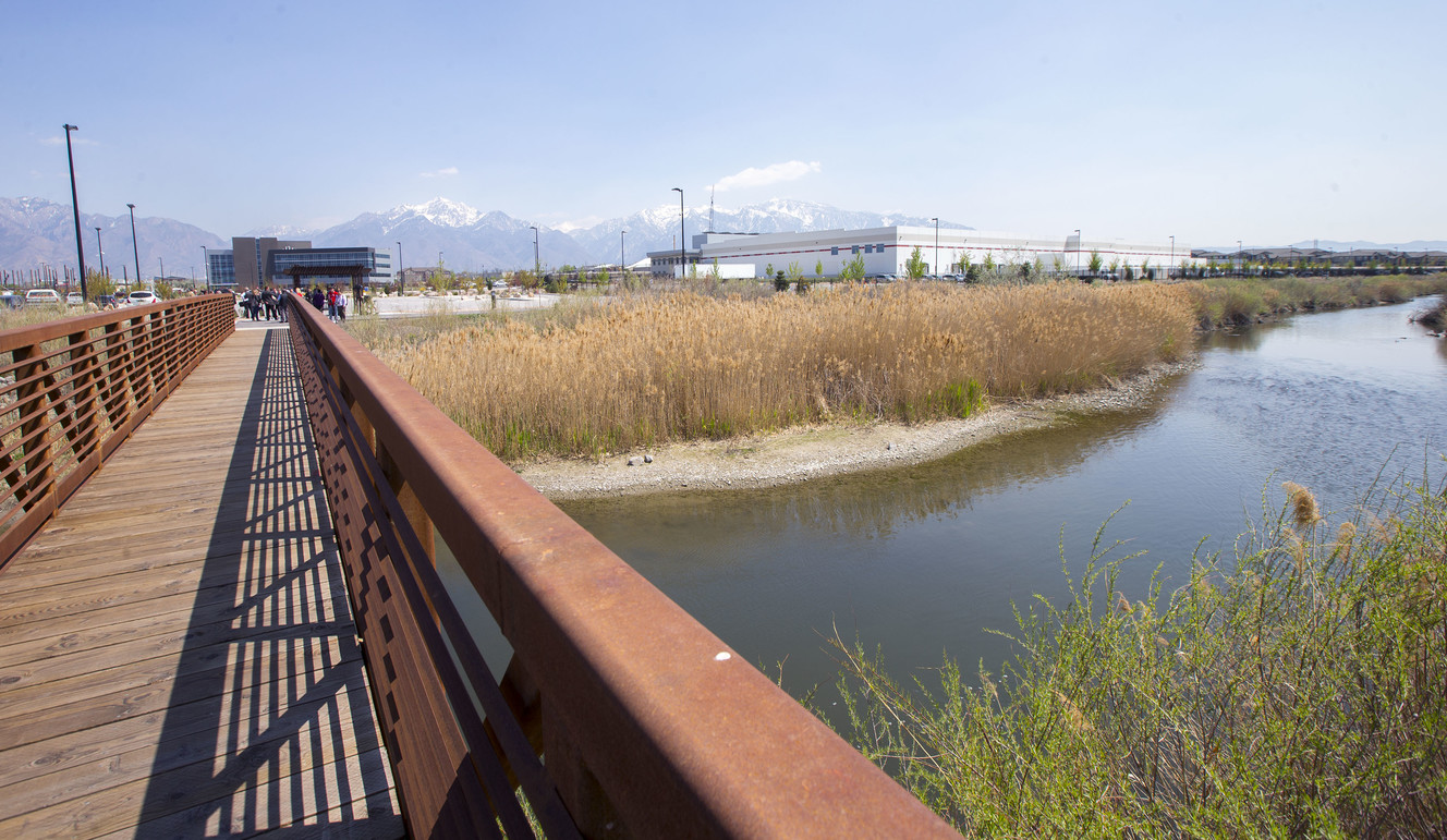 The Jordan River flows past the old smelter area of the Midvale Slag Superfund site as it is removed from the National Priorities List during a ceremony Monday, April 20, 2015, at FLSmidth in Midvale. (Photo: Scott G. Winterton, KSL)