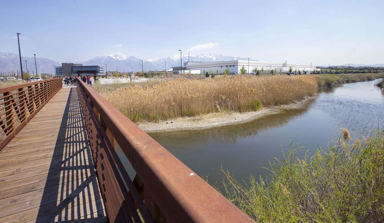 The Jordan River flows past the old smelter area of the Midvale Slag Superfund site as it is removed from the National Priorities List during a ceremony Monday, April 20, 2015, at FLSmidth in Midvale. (Photo: Scott G. Winterton, KSL)