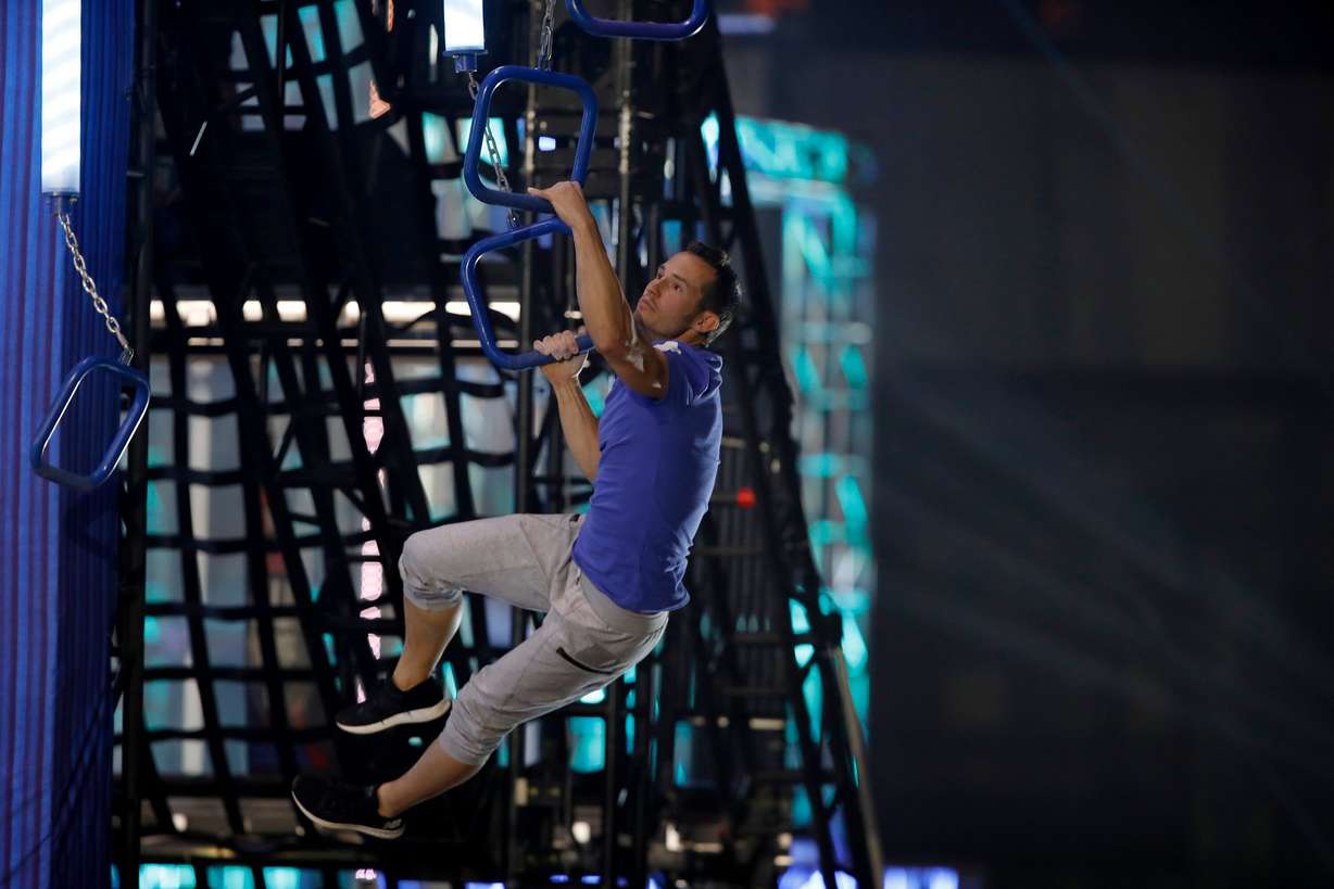 Karson Voiles races on the power tower during the American Ninja Warrior Tacoma city finals. (Courtesy of Karson Voiles)