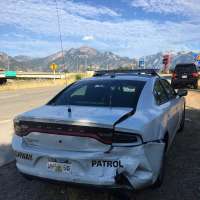 2 Utah troopers' cars hit in separate freeway incidents