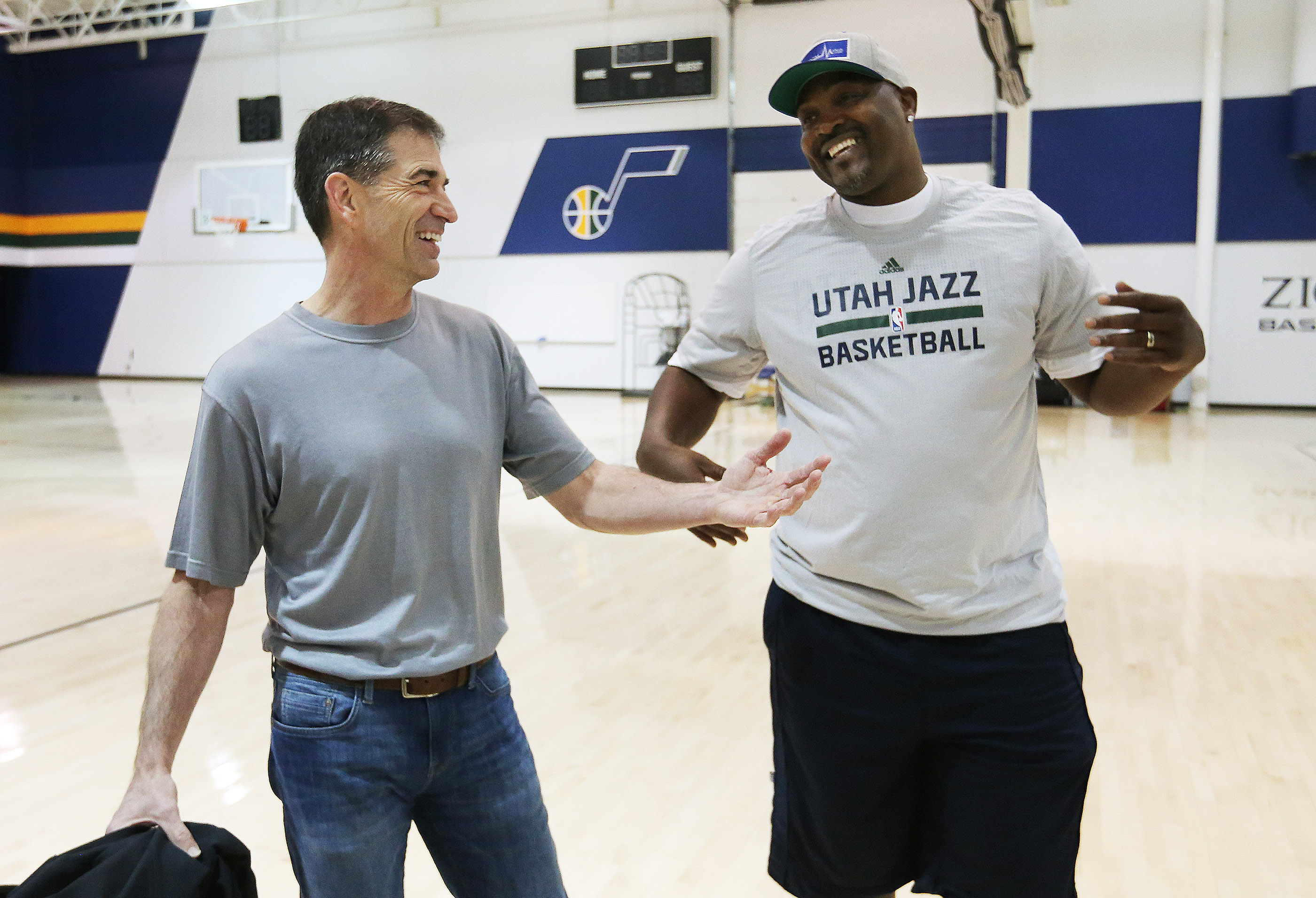 John Stockton laughs with Bryon Russell as the 1997 Utah Jazz team members gather for a reunion in Salt Lake City on Wednesday, March 22, 2017. (Jeffrey. D. Allred, KSL)
