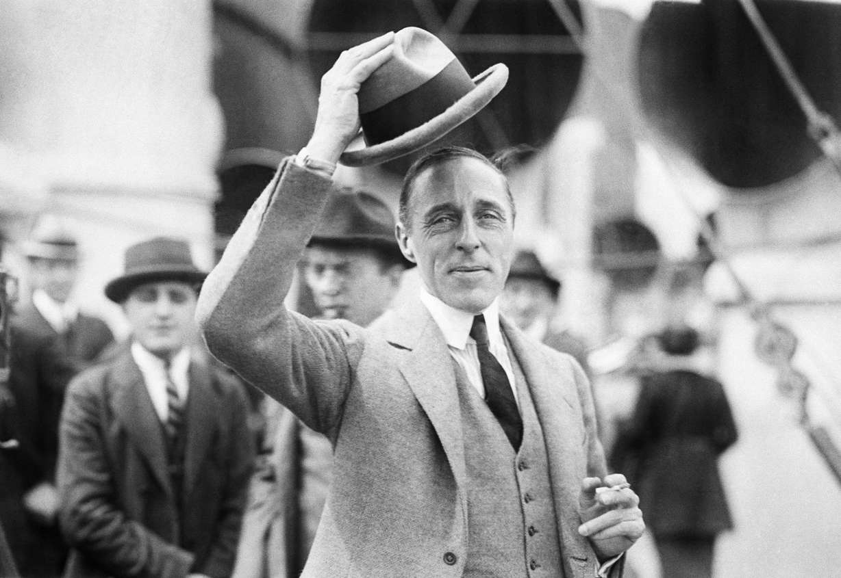 D.W. Griffith, internationally known director of "The Birth of a Nation," greets the press in this 1922 photo before sailing for Europe. (AP Photo)