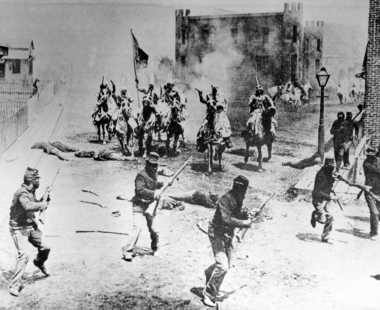 Klansmen ride against the army of occupation in this scene from D.W. Griffith's "Birth of a Nation" filmed in Hollywood, Calif., in 1914. The film was based on Thomas Dixon's "The Clansman," a novel and play set in the American Civil War. The film is said to promote white supremacy. (AP Photo)