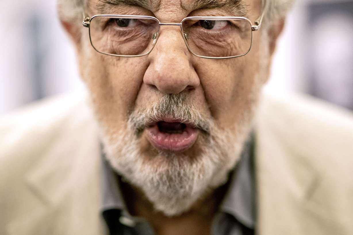 In this Friday, July 12, 2019, photo, Placido Domingo speaks during a news conference about his upcoming show "Giovanna d'Arco" in Madrid, Spain. (Bernat Armangue, AP Photo)