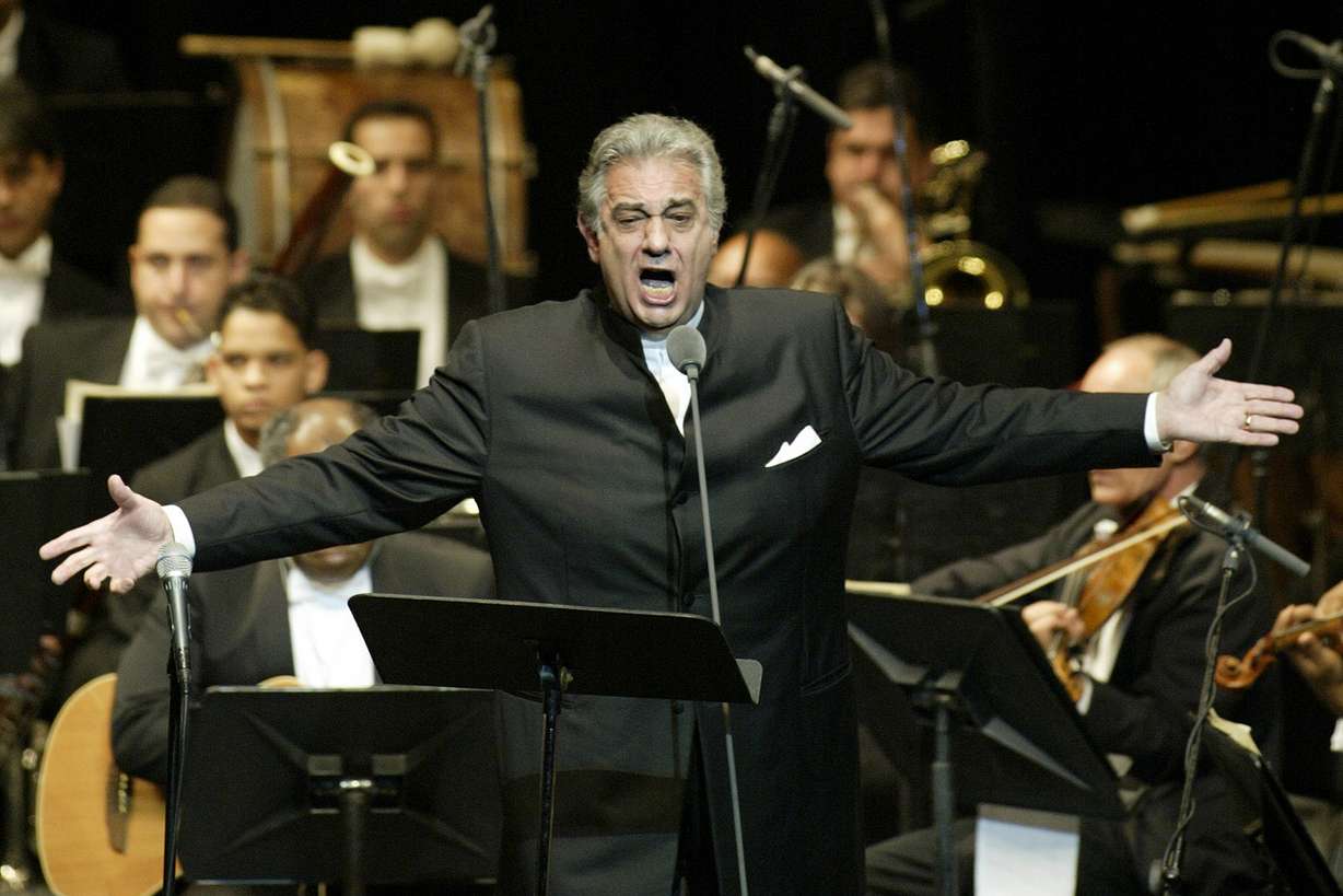 FILE - In this Thursday, Jan. 22, 2004, file photo, Placido Domingo sings during his performance at the National Theater in Santiago, Dominican Republic. (Miguel Gomez, AP Photo, File)