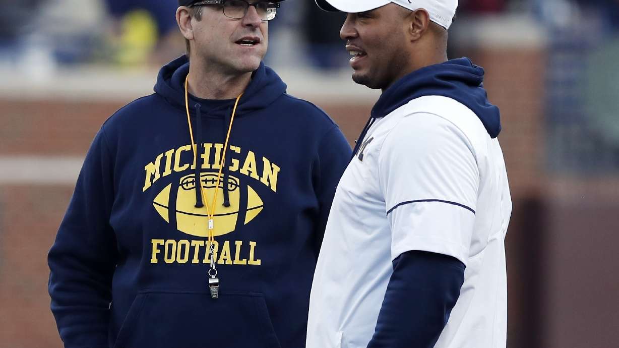 Michigan's Harbaugh says he wouldn't lie about transfer