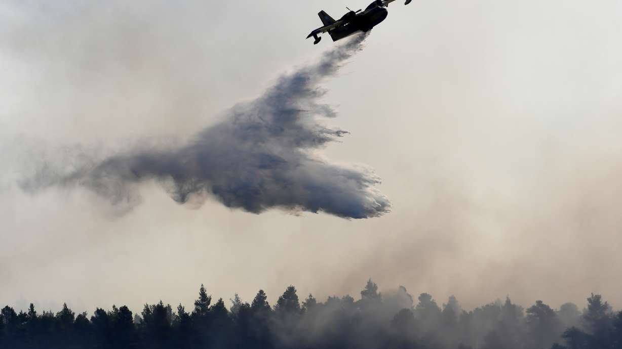 Firefighters battle blaze in Greek island nature reserve