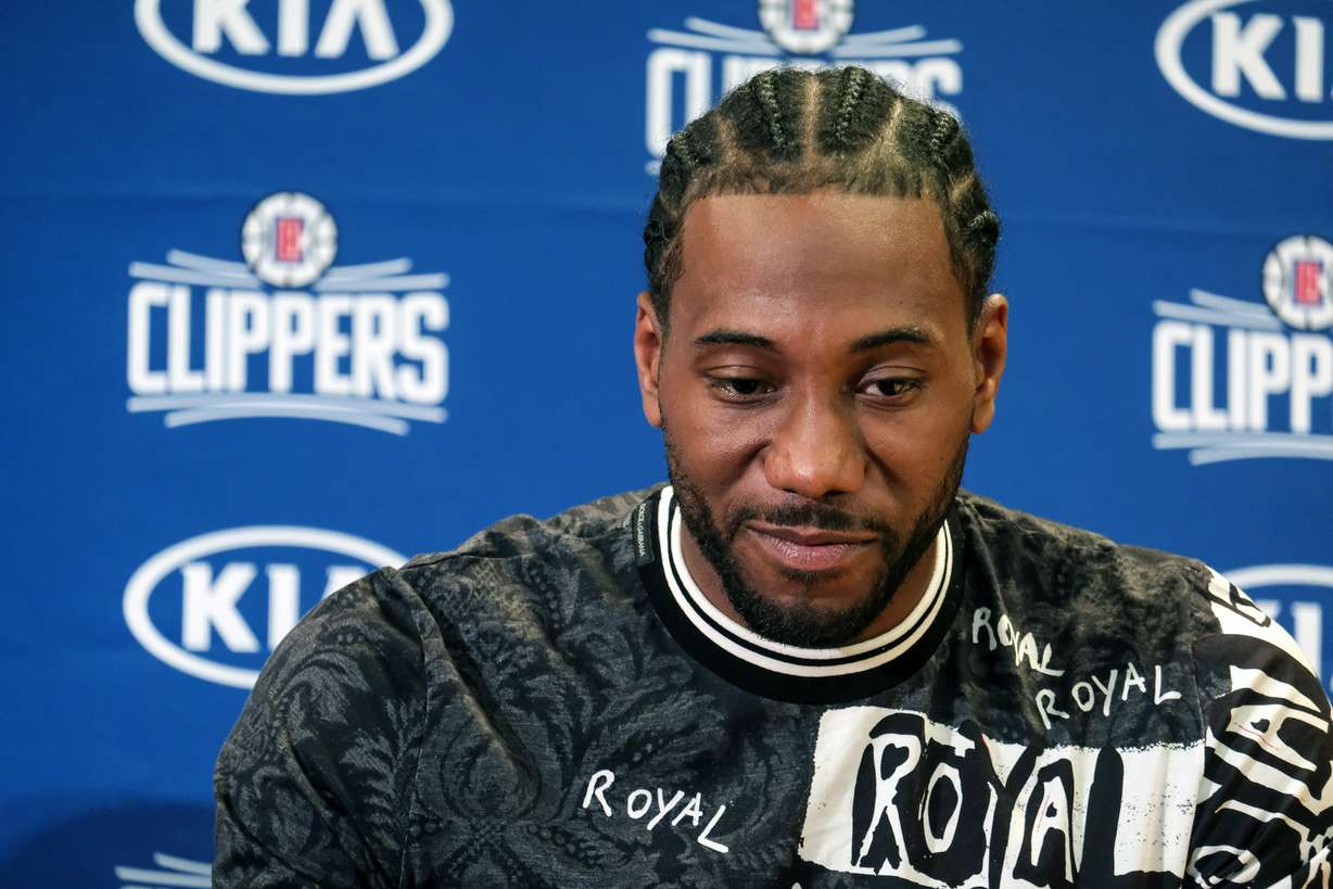 Kawhi Leonard attends a press conference in Los Angeles, Wednesday, July 24, 2019. Nearly three weeks after the native Southern California superstars shook up the NBA by teaming up with the Los Angeles Clippers, the dynamic duo makes its first public appearance. (AP Photo/Ringo H.W. Chiu)