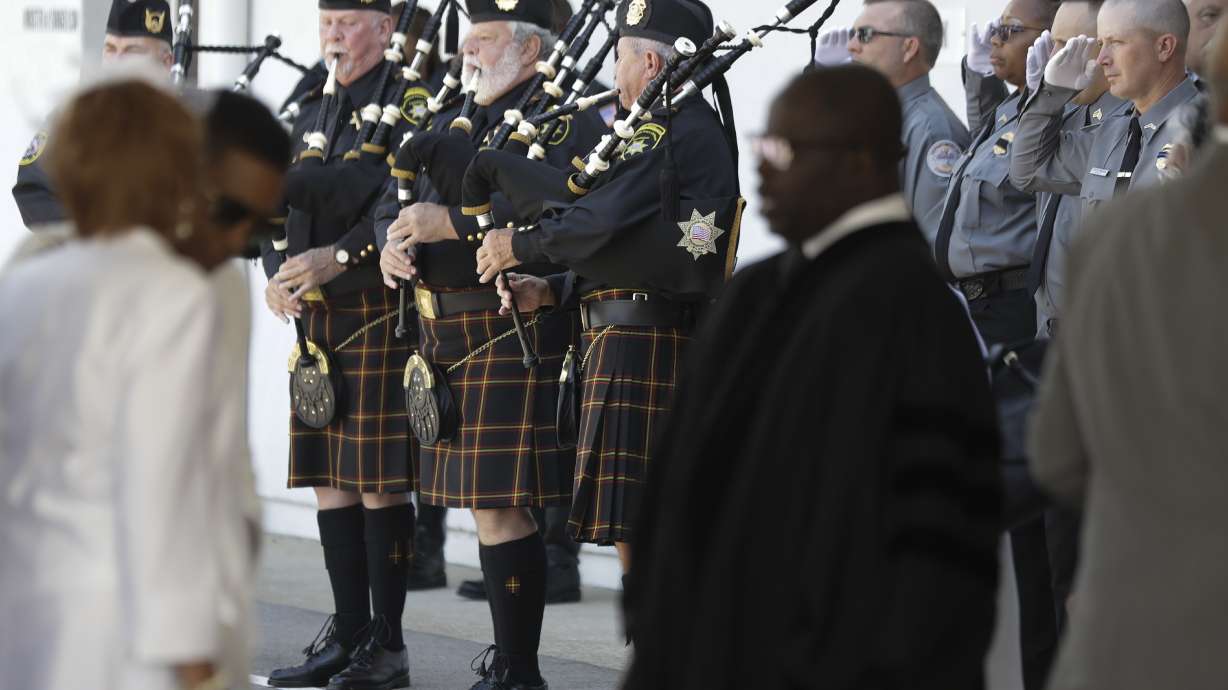 Family, friends bid goodbye to slain corrections employee