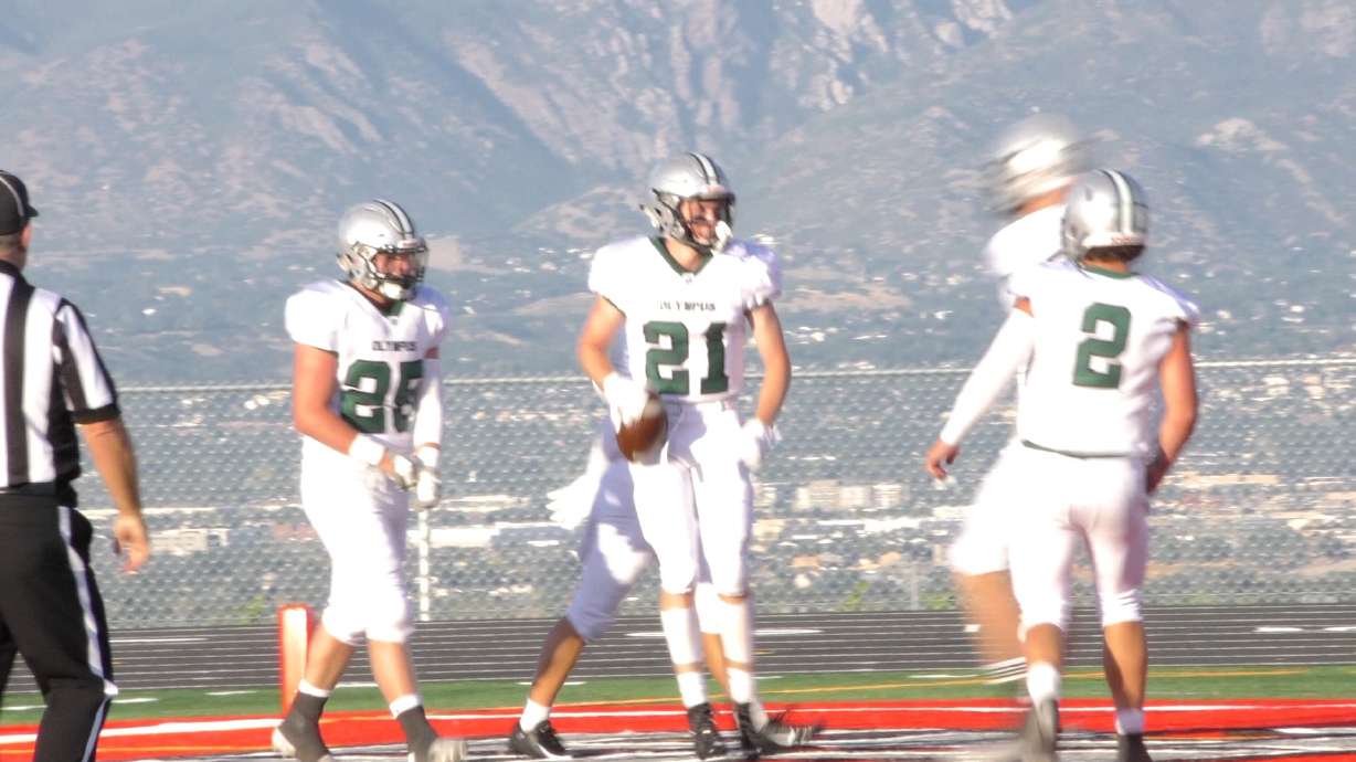 Scotty Edwards' 5 TDs help Olympus roll past newcomers Mountain Ridge, 56-0