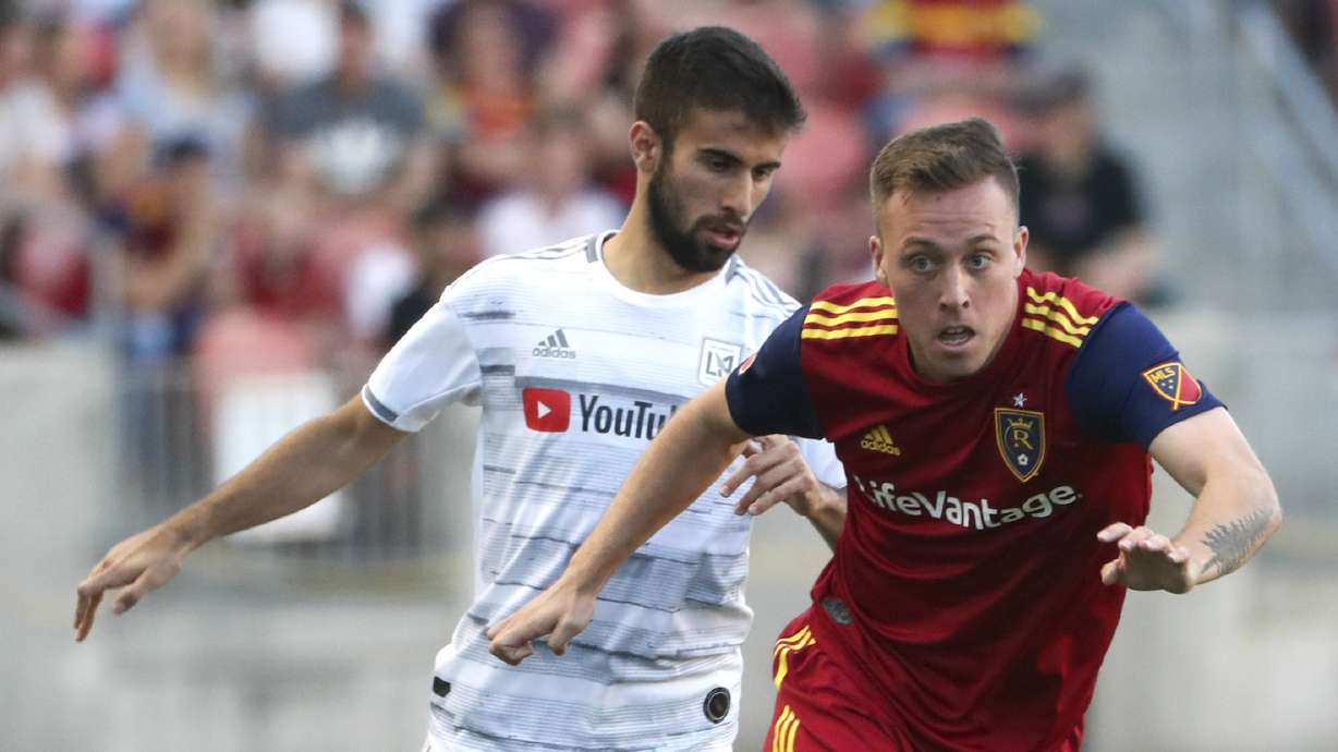 Real Salt Lake forward Corey Baird (17) gets past Los Angeles FC forward Diego Rossi (9) as he looks to pass during the RSL versus LAFC U.S. Open Cup match at Rio Tinto Stadium in Sandy on Tuesday, June11, 2019.