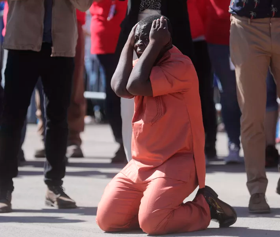 Ashraf Kambere reacts to seeing his new house in Ogden as HGTV’s “Extreme Makeover: Home Edition” films him and his family on Thursday, Aug. 15, 2019. (Photo: Kristin Murphy, KSL)