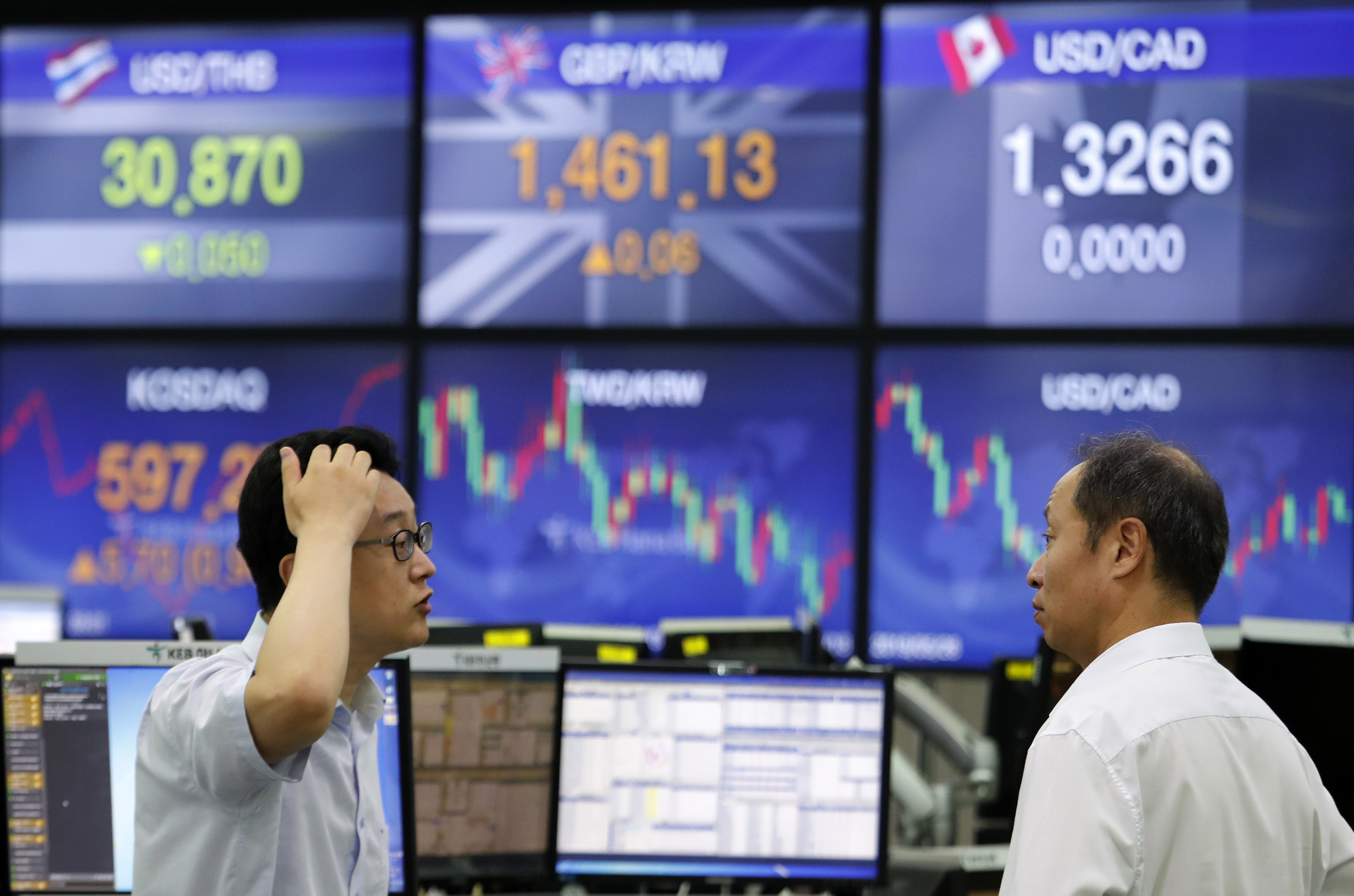 Asian shares rise as investors watch trade war, economies