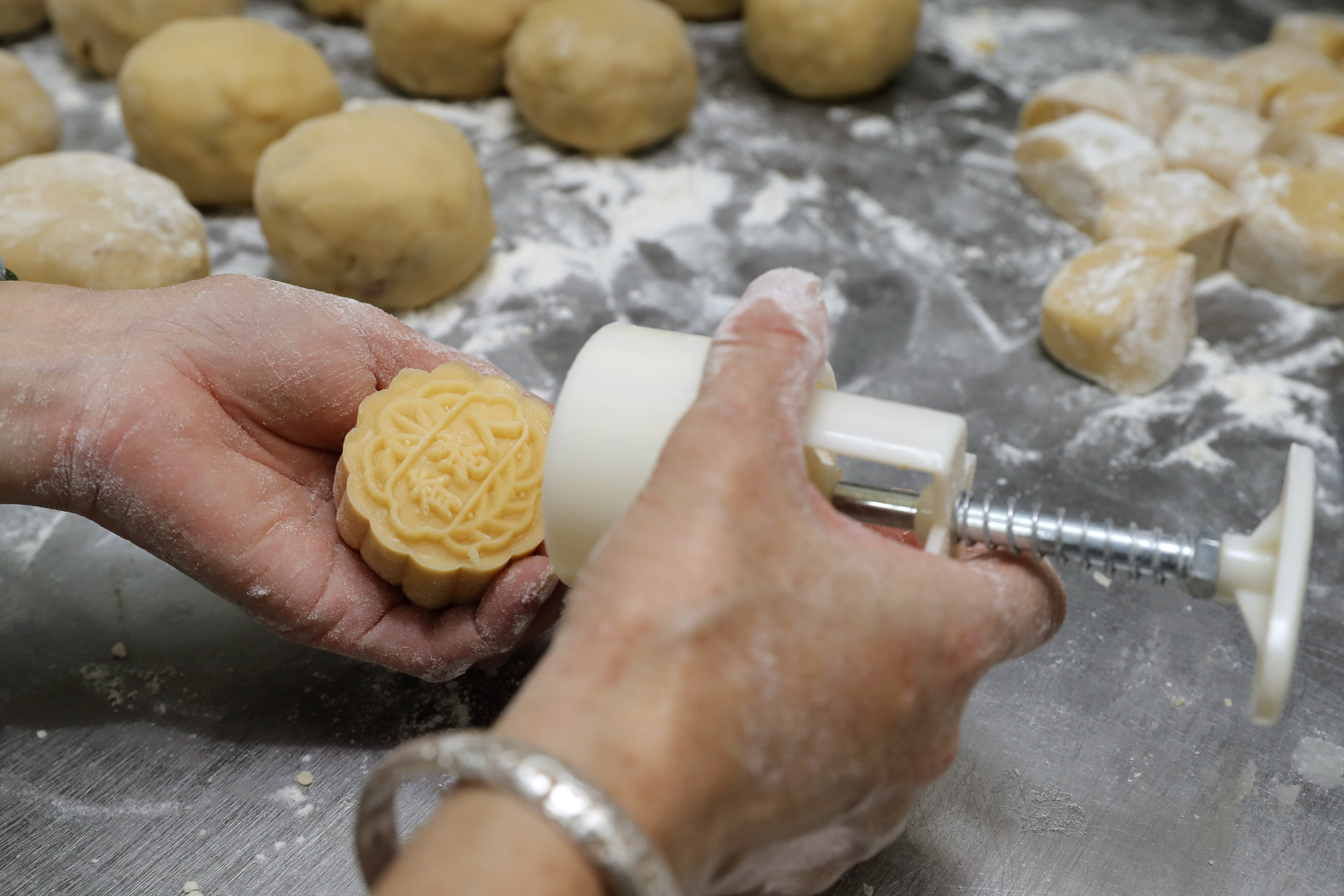Hong Kong bakery's mooncakes carry protest movement slogans