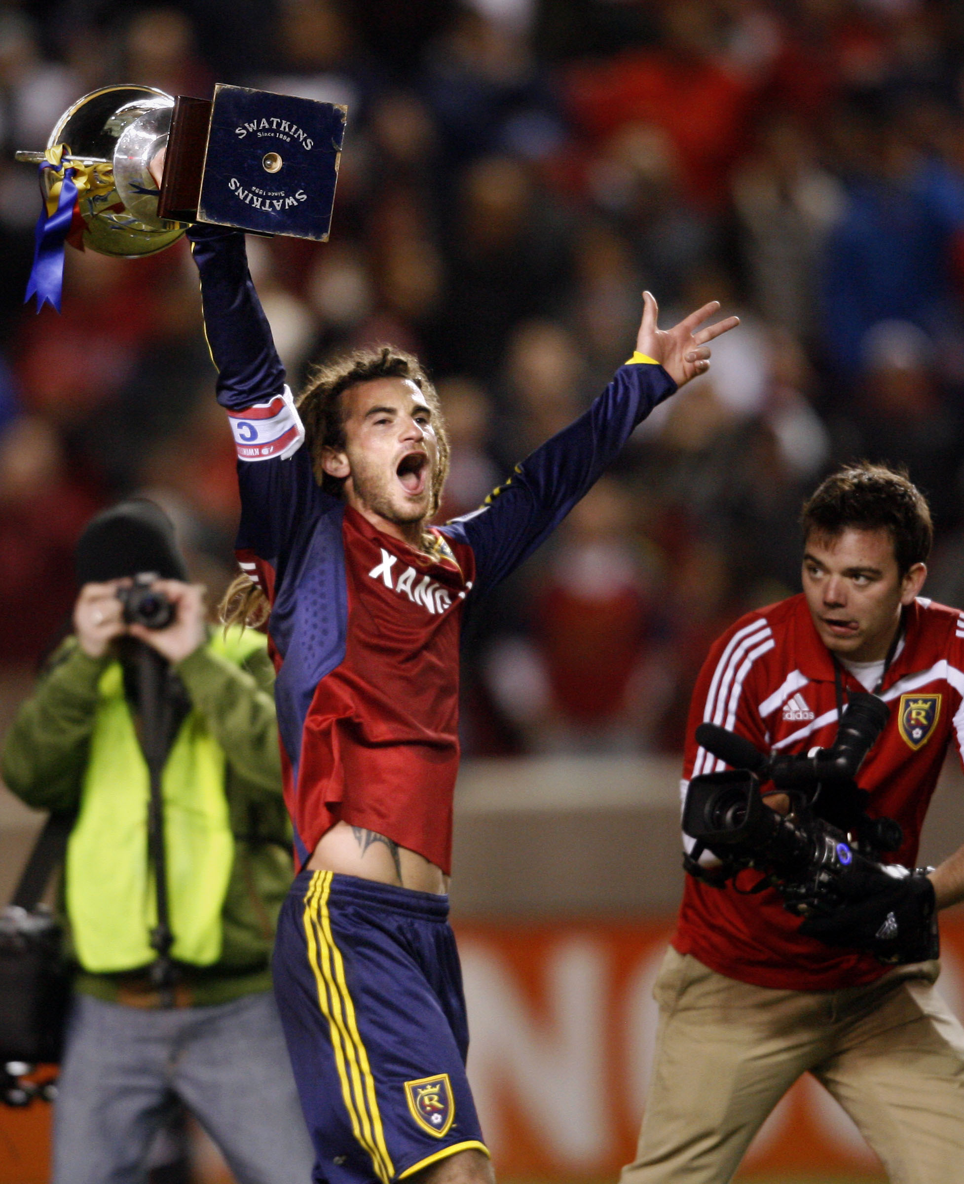 Kyle Beckerman holds up the Rocky Mountain Cup, celebrating Real Salt Lake's 3-0 win over the Colorado Rapids at the Rio Tinto Stadium in Sandy, Utah, on Saturday, October 24, 2009. (Photo: Kristin Murphy, KSL)