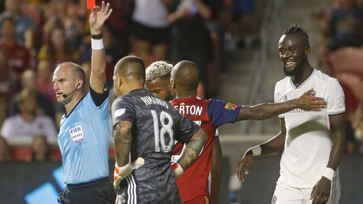 Colorado Rapids forward Kei Kamara (23) looks toward the official after receiving a red card in the second half of the team's MLS soccer match against Real Salt Lake on Saturday, Aug. 24, 2019, in Sandy, Utah. (AP Photo/Rick Bowmer)