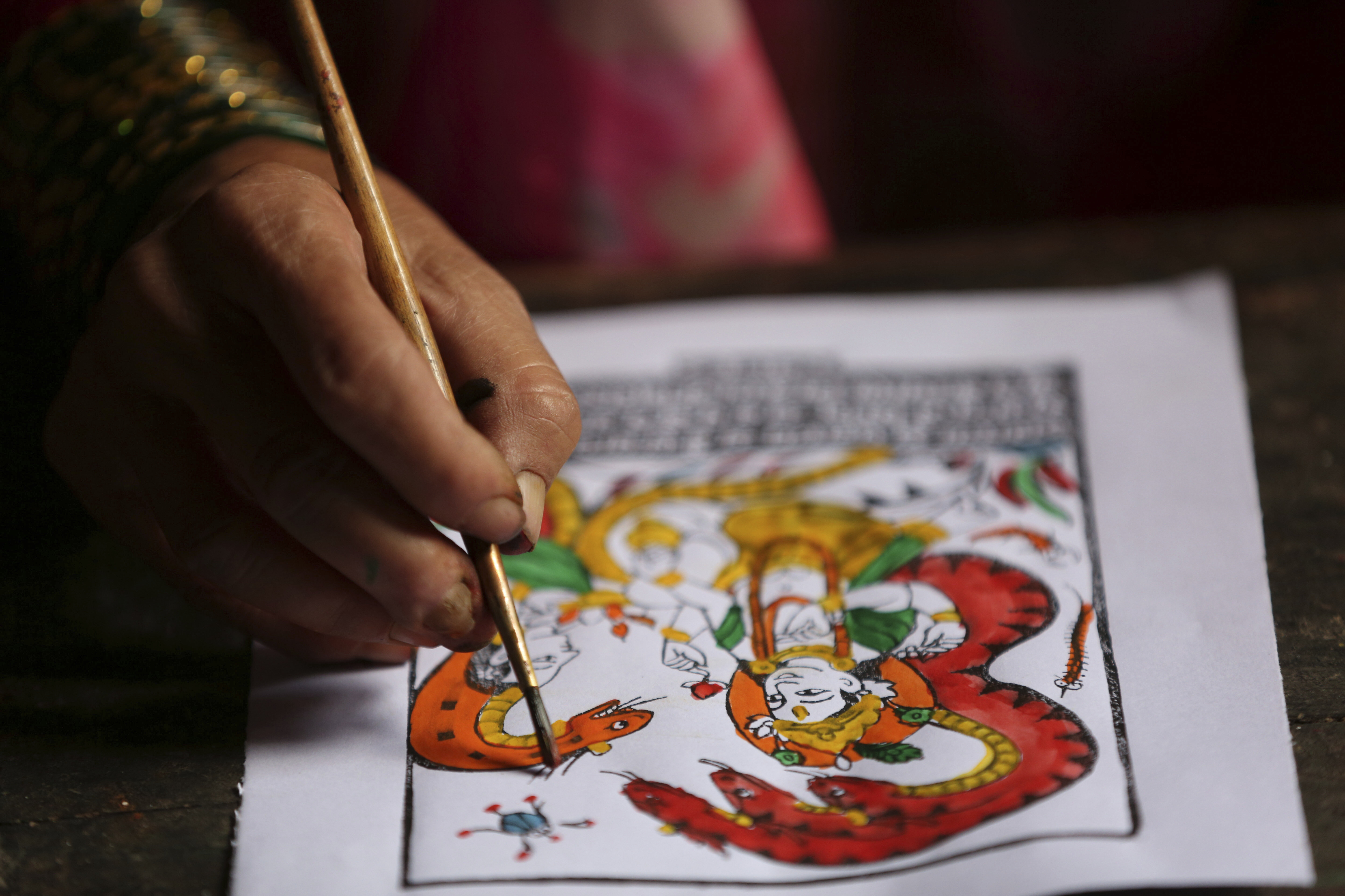 AP PHOTOS: Nepal's painter caste struggles to save dying art