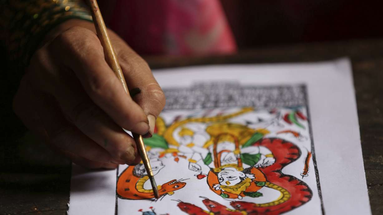 AP PHOTOS: Nepal's painter caste struggles to save dying art