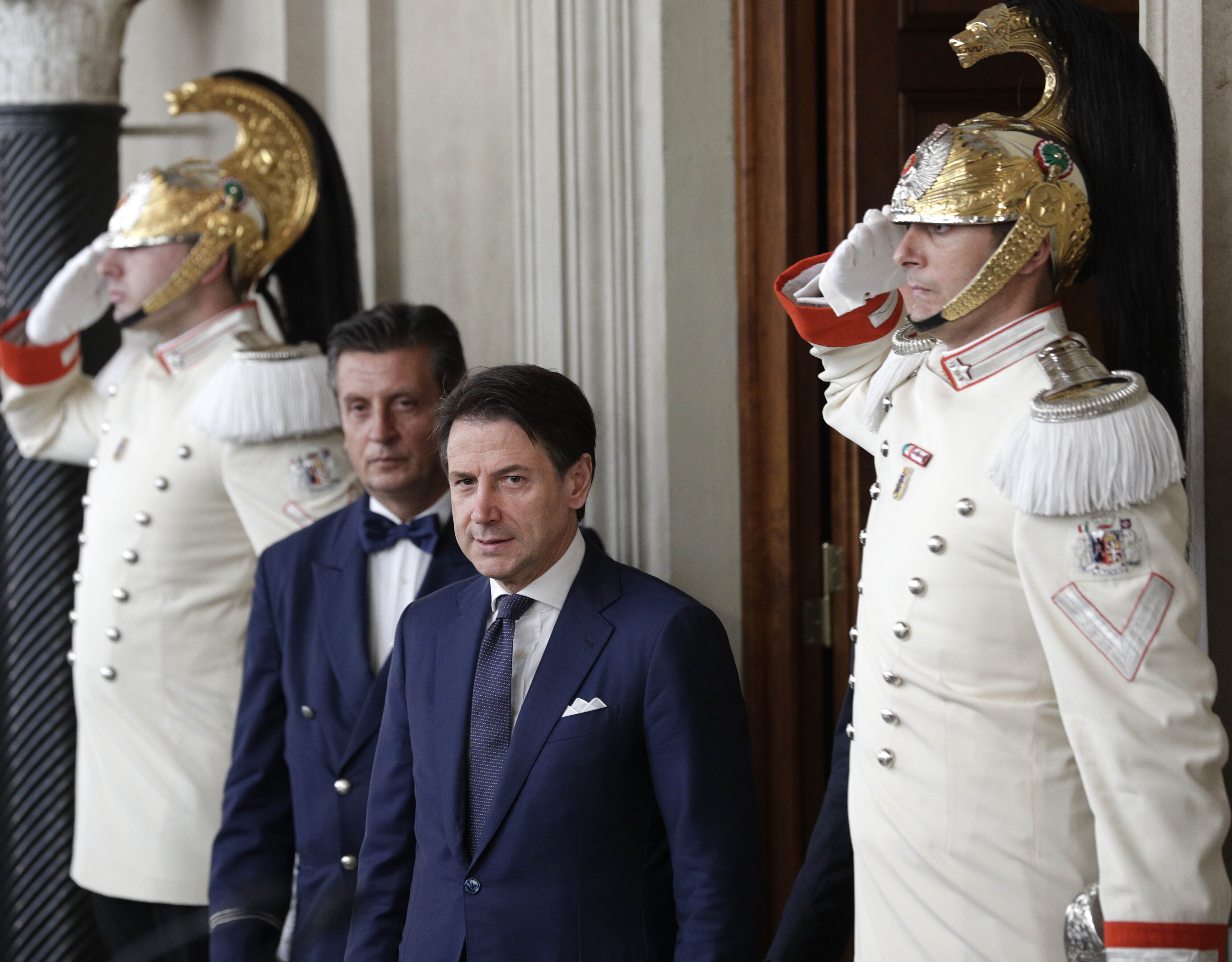 Italy's soft-spoken Conte raises his voice, wins new mandate