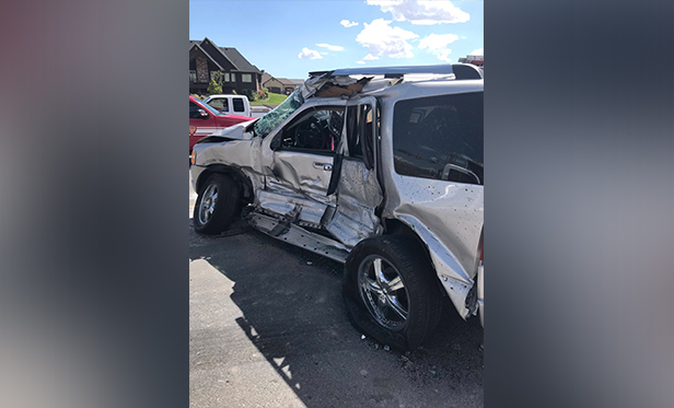 Woman flown to hospital in critical condition after crash with semitruck