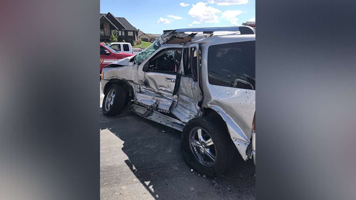 Woman flown to hospital in critical condition after crash with semitruck