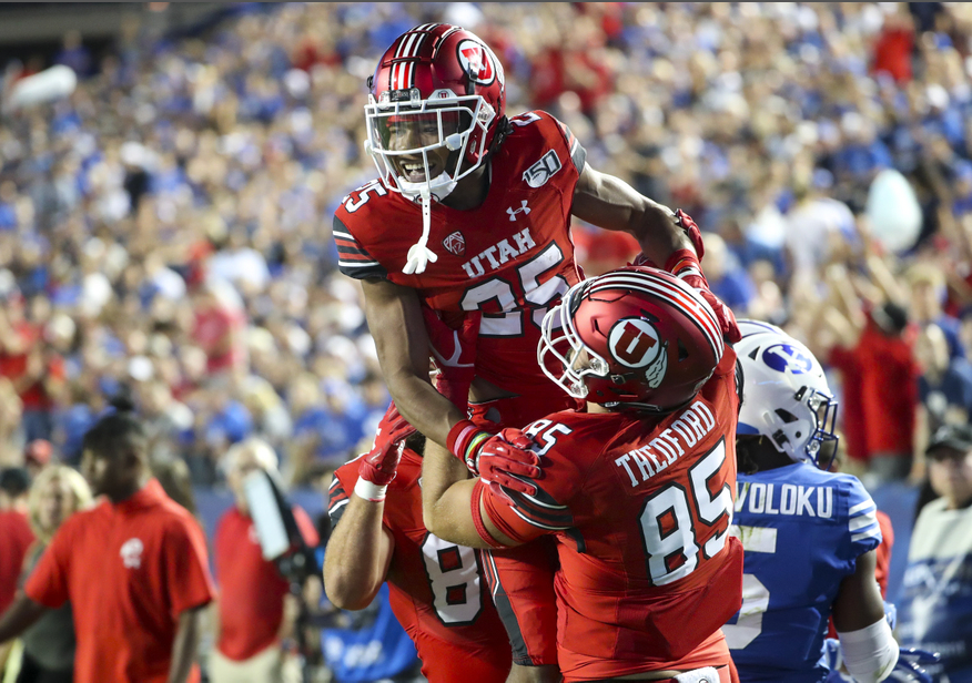 Utah's Jaylen Dixon celebrates after scoring a touchdown against BYU, Thursday, Aug. 29, 2019 in Provo. (Photo: Steve Griffin, Deseret News)