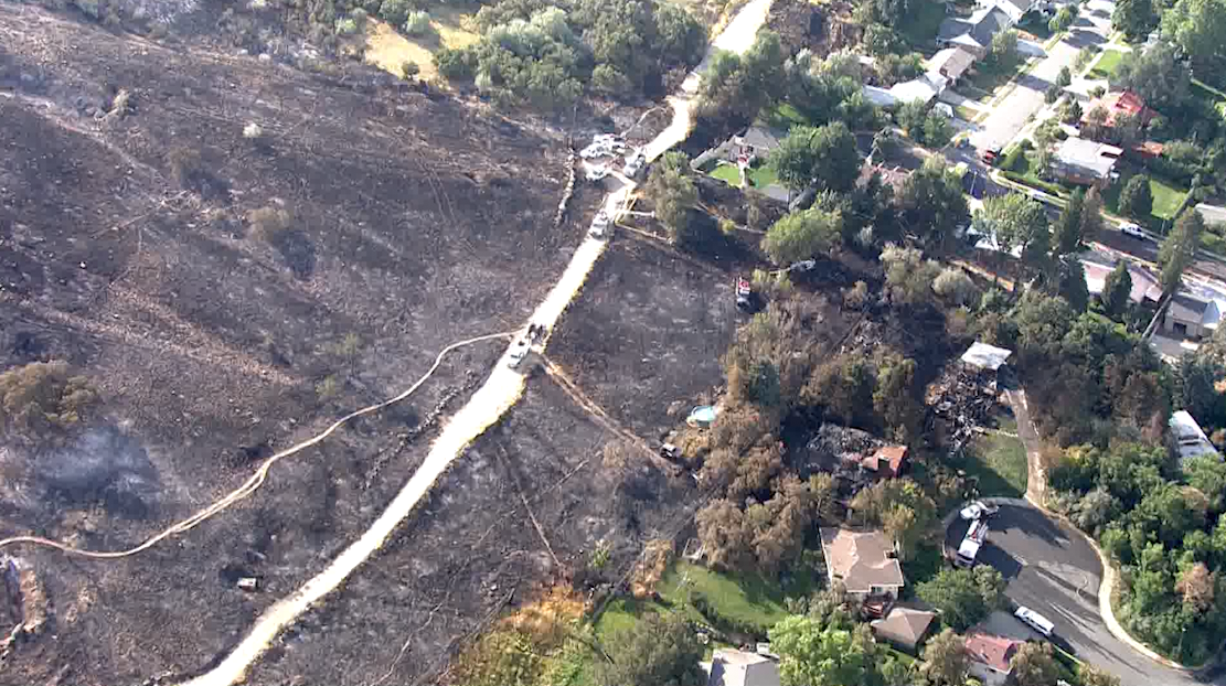 A thick haze filled the air as the sun rose above the mountains in Davis County after a large fire forced hundreds of evacuations Friday, Aug. 30, 2019. (Photo: Chopper 5, File)