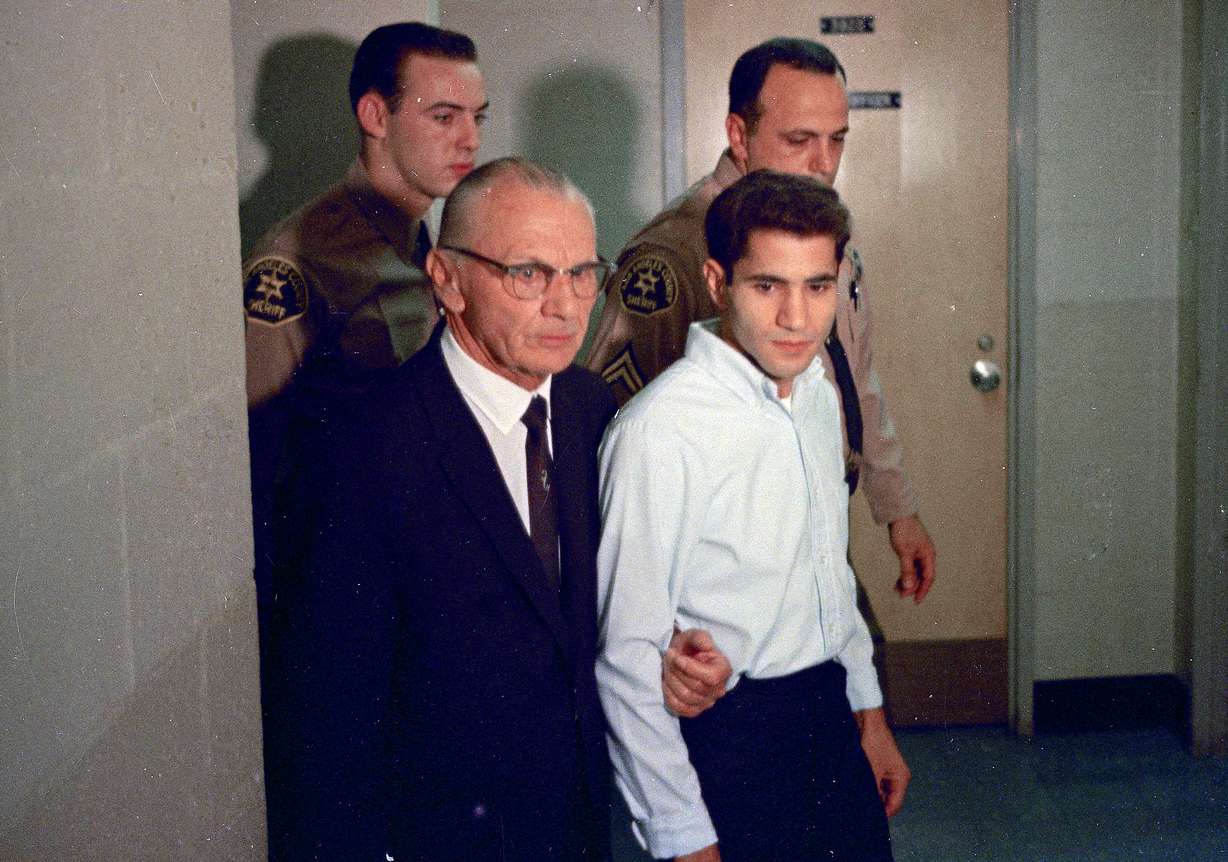 This June 1968 file photo shows Sirhan Sirhan, right, a suspect of shooting Sen. Robert F. Kennedy, with his attorney Russell E. Parsons in Los Angeles. Associated Press Hollywood reporter Bob Thomas was on a one-night political assignment in June 1968 to cover Kennedy’s victory in the California presidential primary when mayhem unfolded before his eyes. (AP Photo, File)