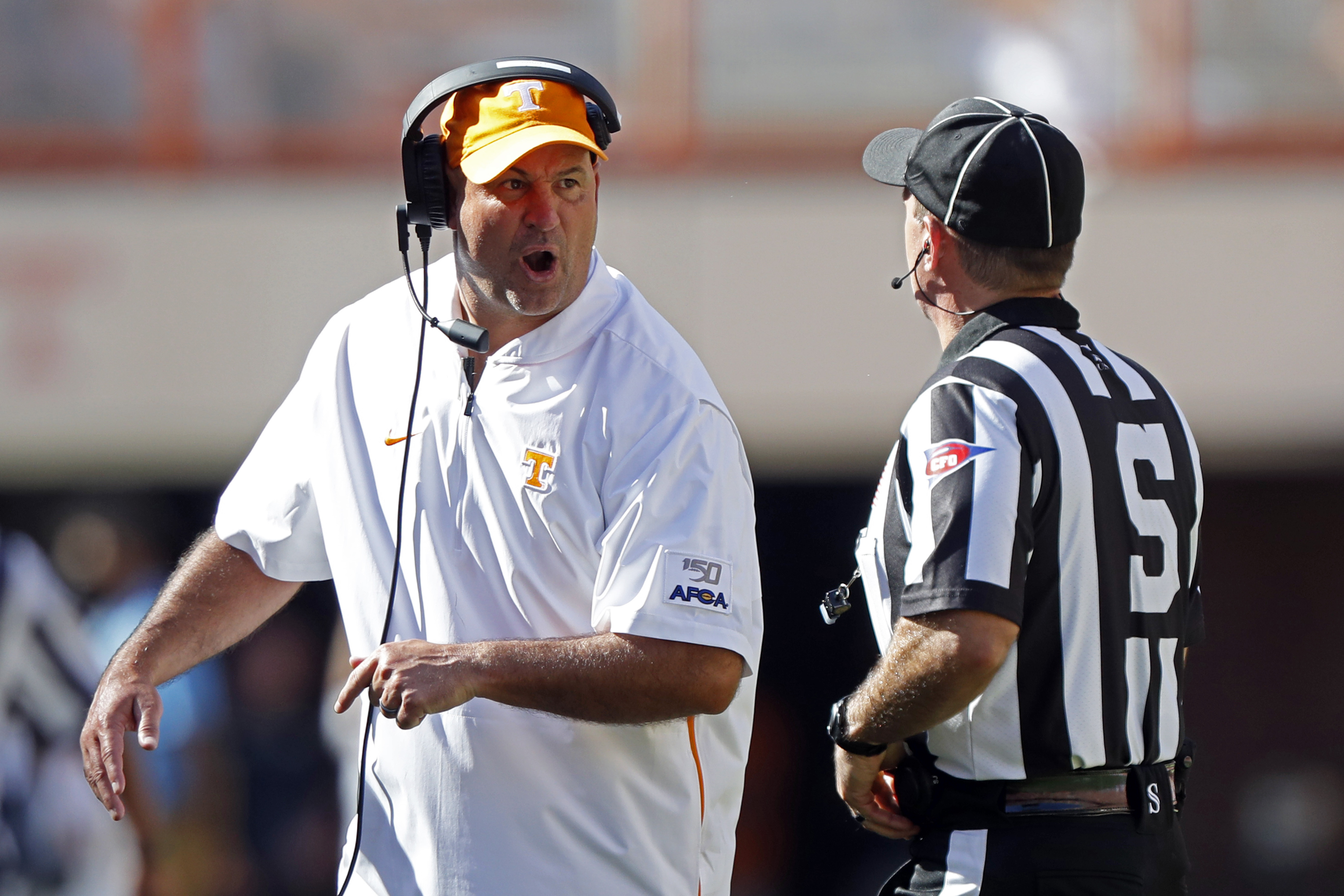 Tennessee head coach Jeremy Pruitt yells at side judge Eduardo Balbis in the first half of an NCAA college football game against Georgia State, Saturday, Aug. 31, 2019, in Knoxville, Tenn. (Photo: Wade Payne, AP)