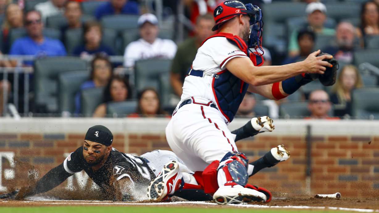 Keuchel's rare 2-run single helps Braves top White Sox 11-5