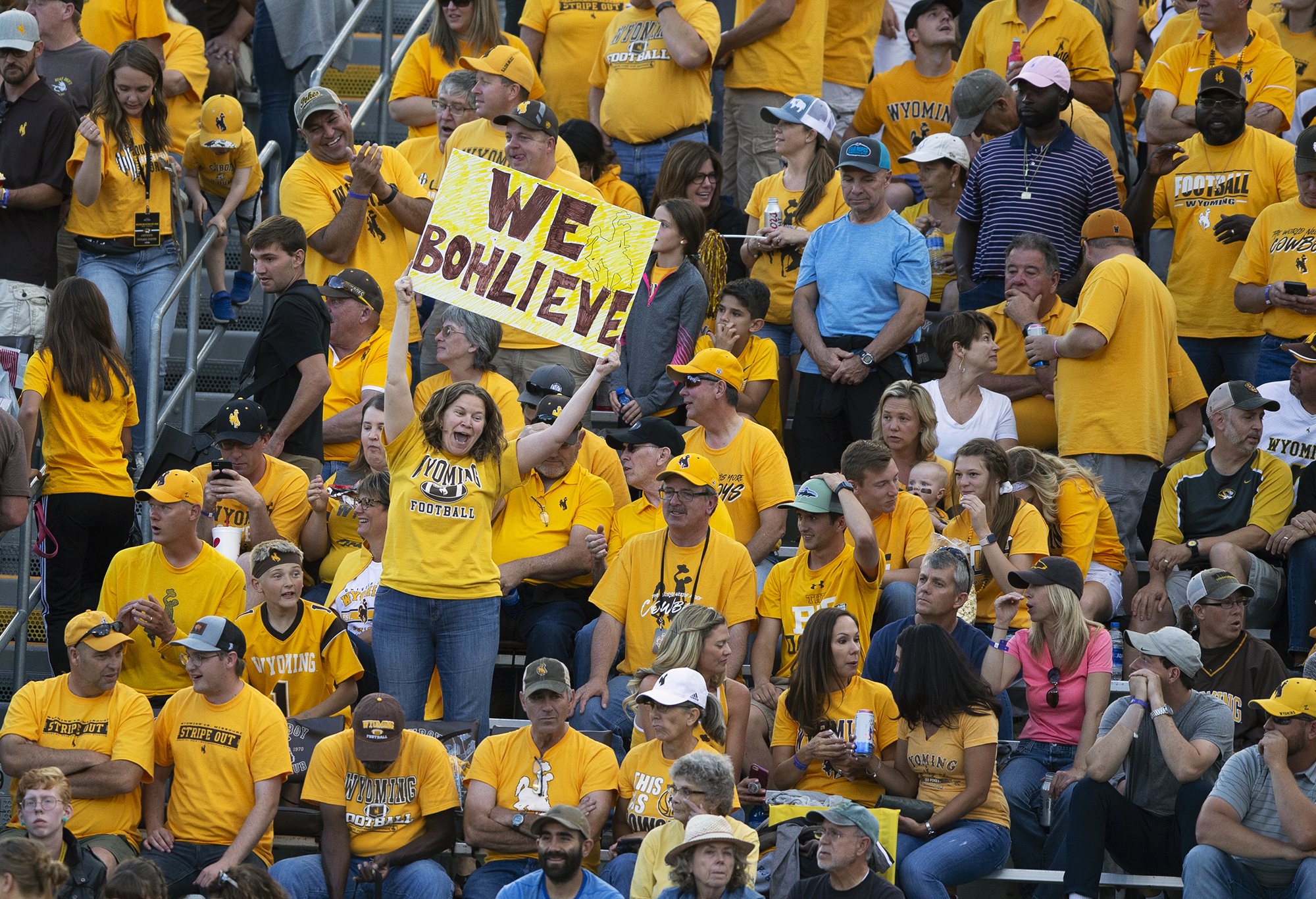 A Wyoming fan showing her support for head coach Craig Bohl during an NCAA college football game, Aug. 31, 2019.