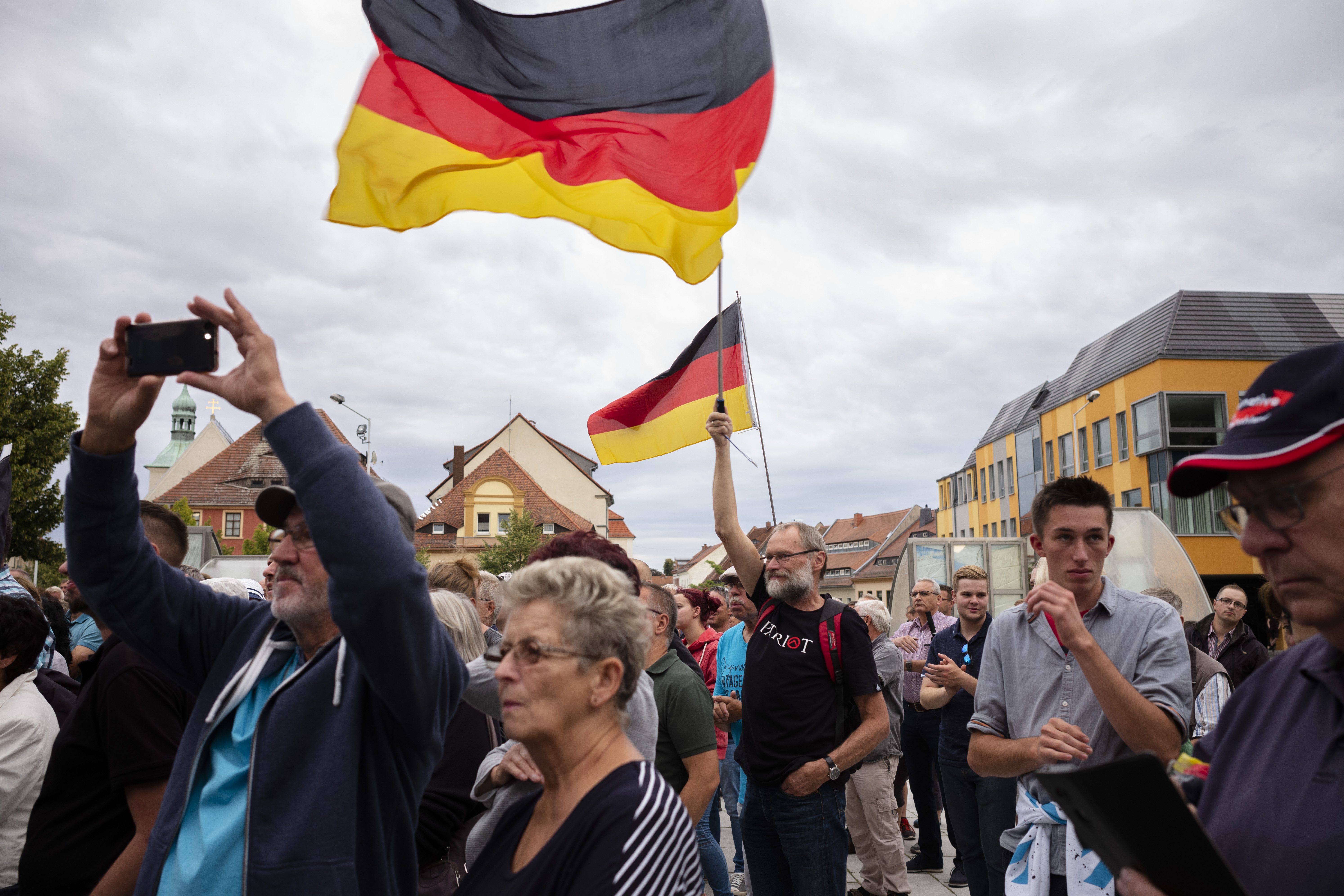 The Latest: Exit polls show far-right gains in German states