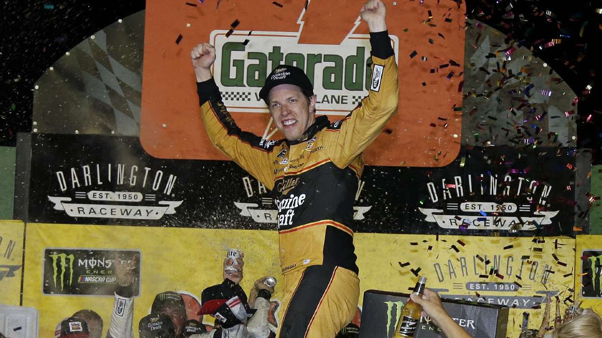 The Latest: Jones holds off Kyle Busch to win Darlington
