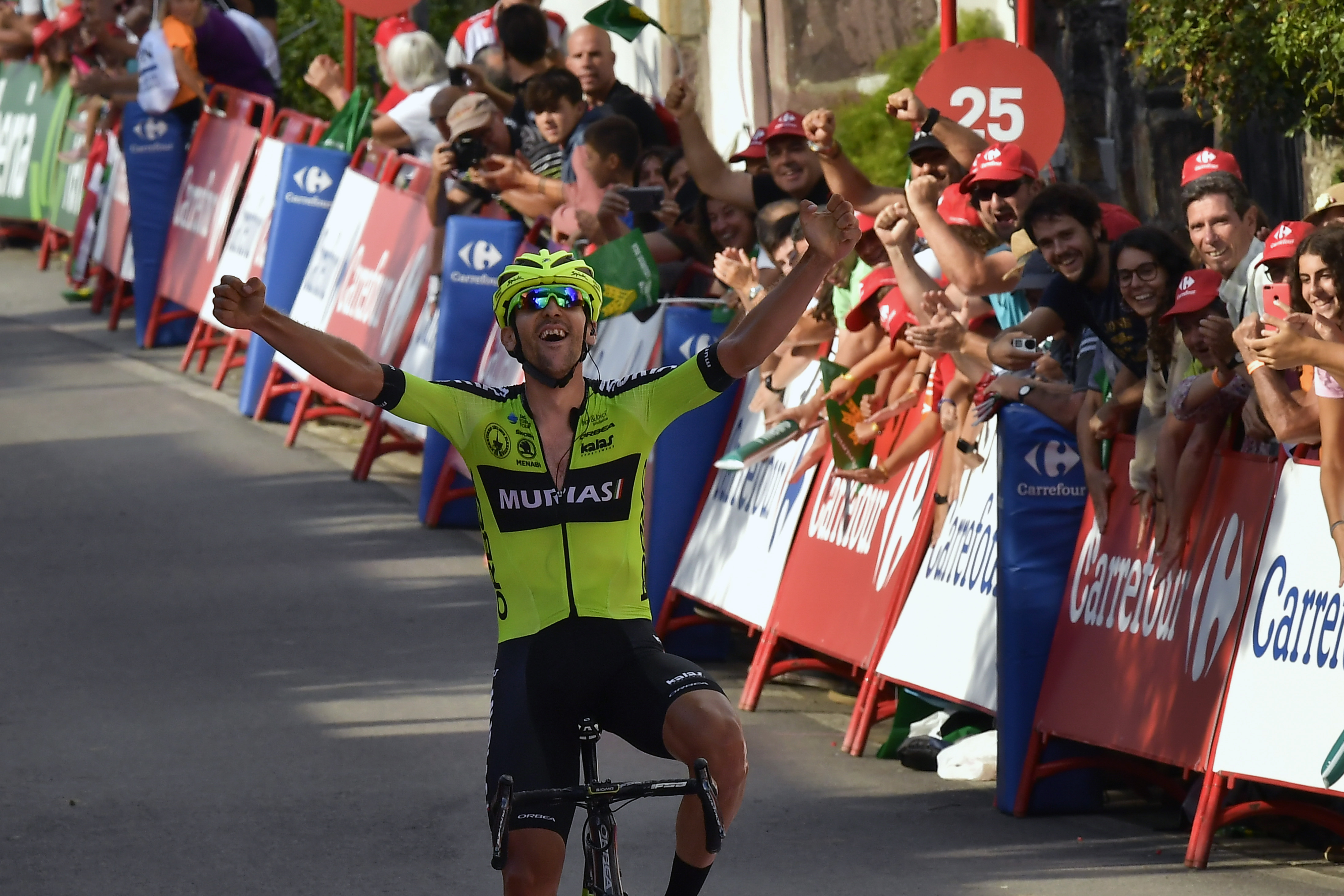 Close to home, Iturria takes Vuelta stage for 1st win