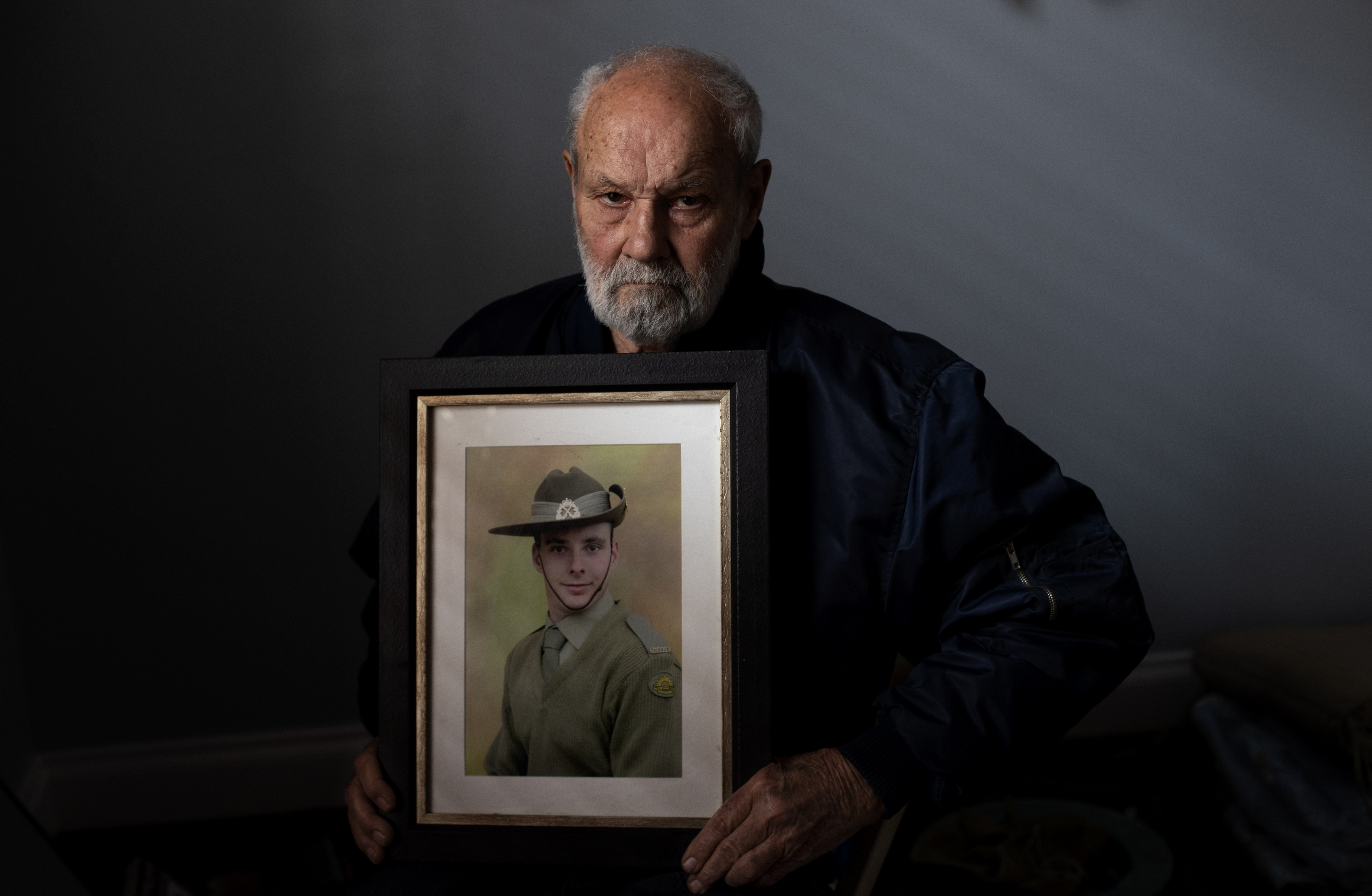 David Tonkin holds a photo of his late son, Matthew, in his room at their home in Perth, Australia, Sunday, July 21, 2019. Photo: David Goldman, AP Photo
