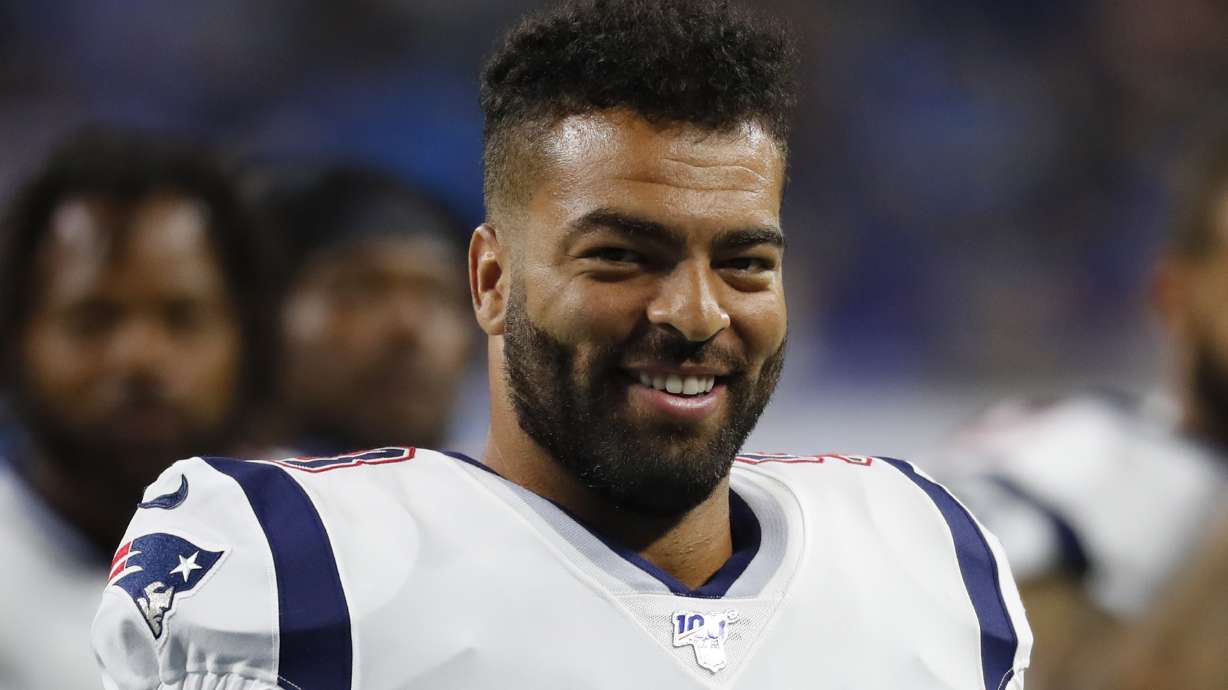 New England Patriots middle linebacker Kyle Van Noy (53) smiles walking on the field against the Detroit Lions during an NFL preseason football game in Detroit, Thursday, Aug. 8, 2019.