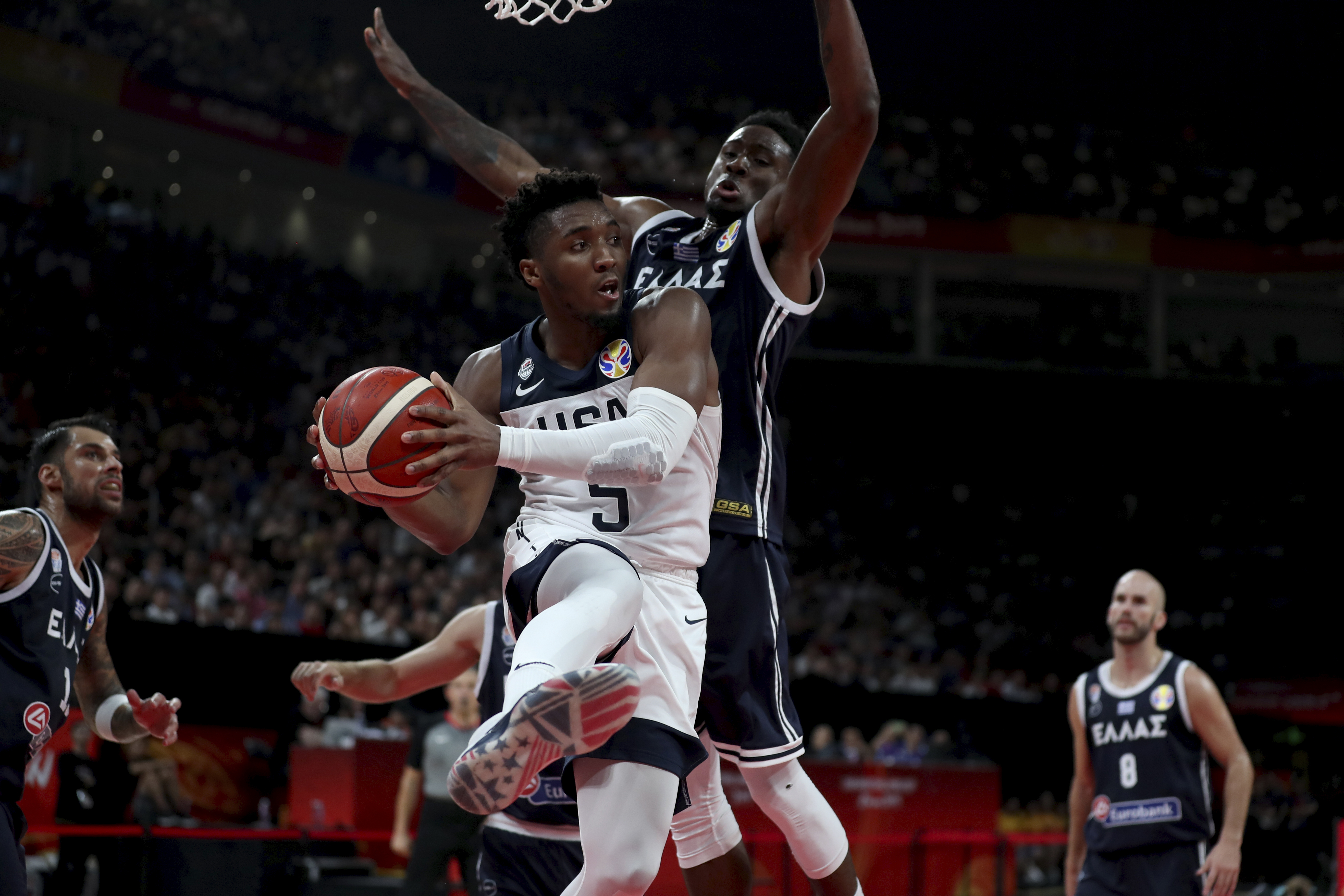 US loses to Serbia 94-89, assuring worst big-tourney finish